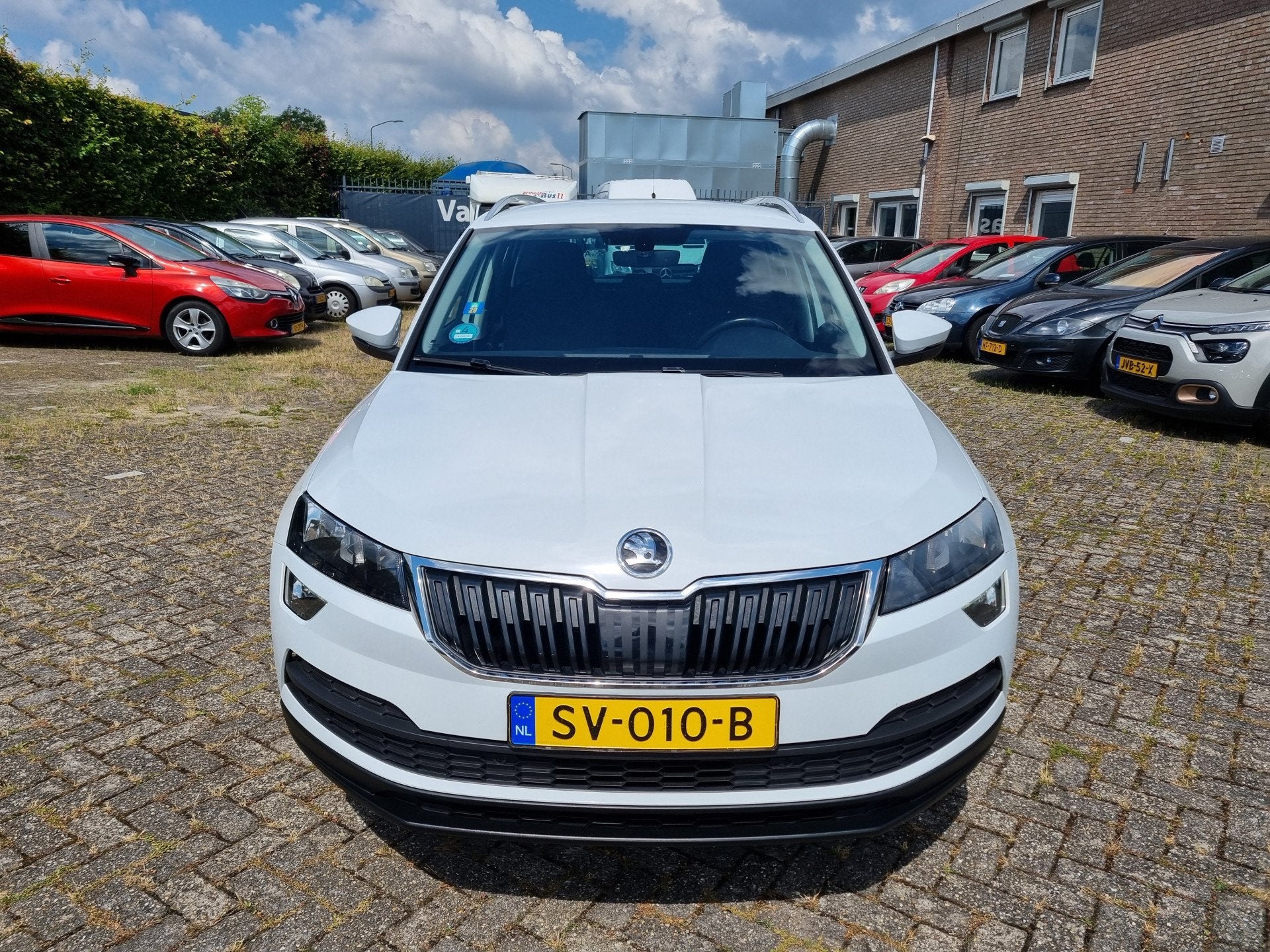 Skoda Karoq 1.0 TSI Ambition Business ✅NETTE AUTO ✅CARPL, Auto's, Skoda, Voorwielaandrijving, Stof, Gebruikt, Euro 6
