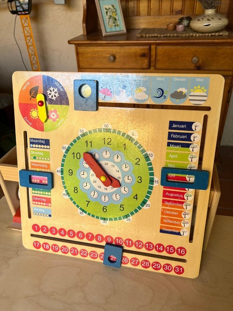 Kalenderklok hout New Classic Toys, Kinderen en Baby's, Speelgoed | Houten speelgoed, Ophalen, Zo goed als nieuw, Overige typen