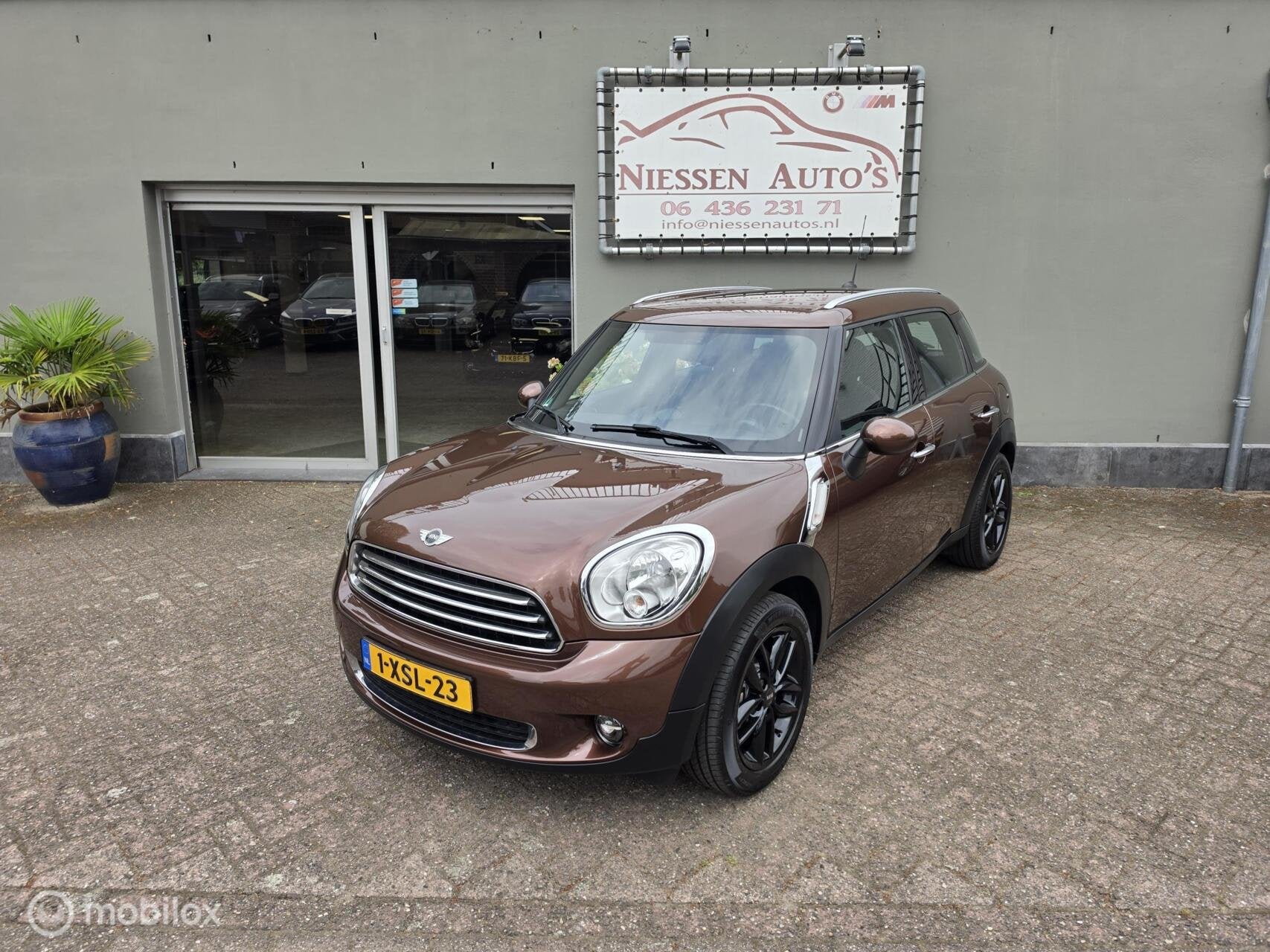 Mini Countryman R60 1.6 Navi/Airco/Ketting Vervangen, Auto's, Mini, Voorwielaandrijving, Stof, Bruin, Bedrijf