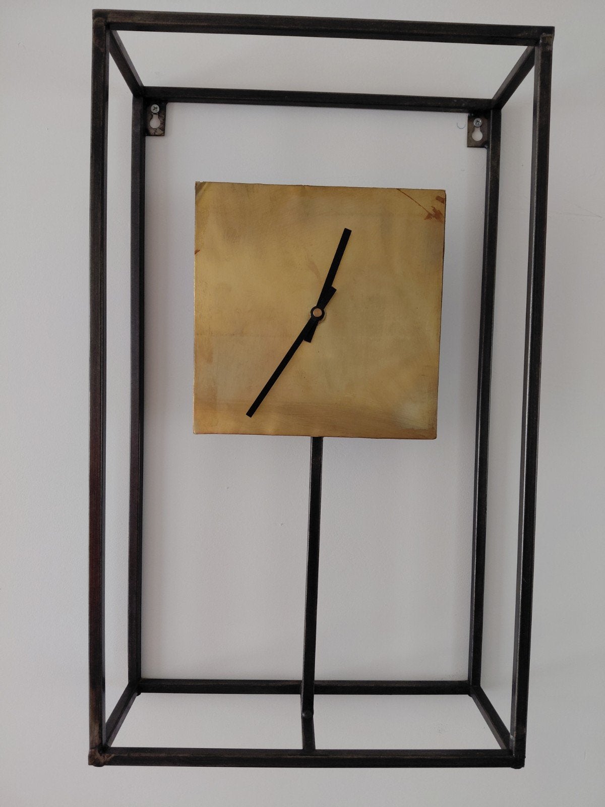 Moderne wandklok in metalen frame - PTMD Collection, Huis en Inrichting, Ophalen