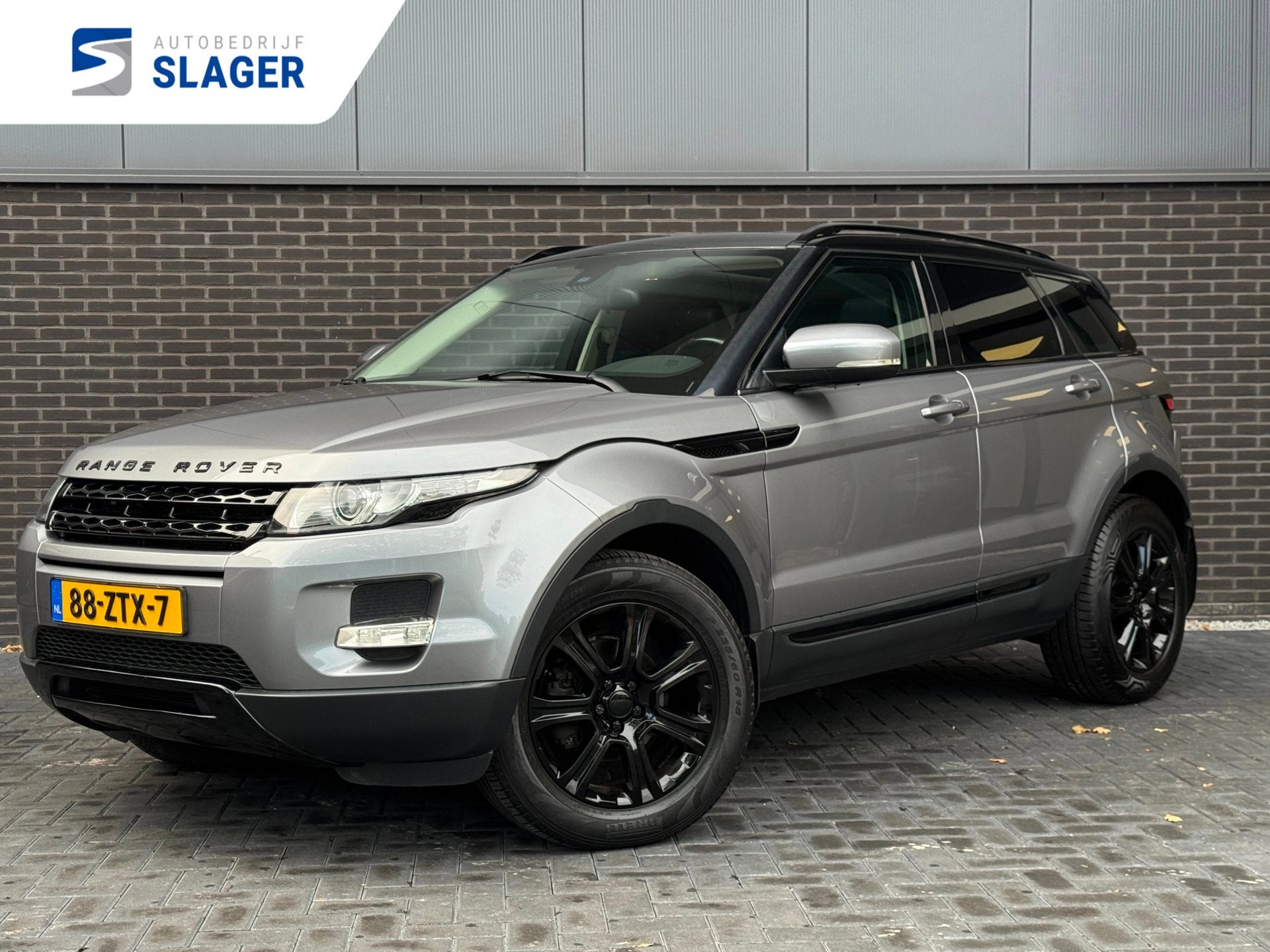 Land Rover Range Rover Evoque 2.0 Si 4WD Prestige - Leder|Na, Auto's, Automaat, Euro 5, Zwart, 4 cilinders