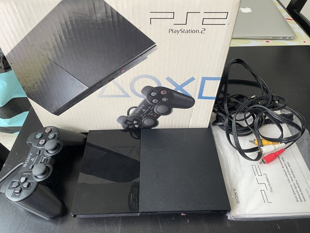 PlayStation 2, Spelcomputers en Games, Spelcomputers | Sony PlayStation 2, Zwart, Ophalen of Verzenden, Zo goed als nieuw, Met 1 controller