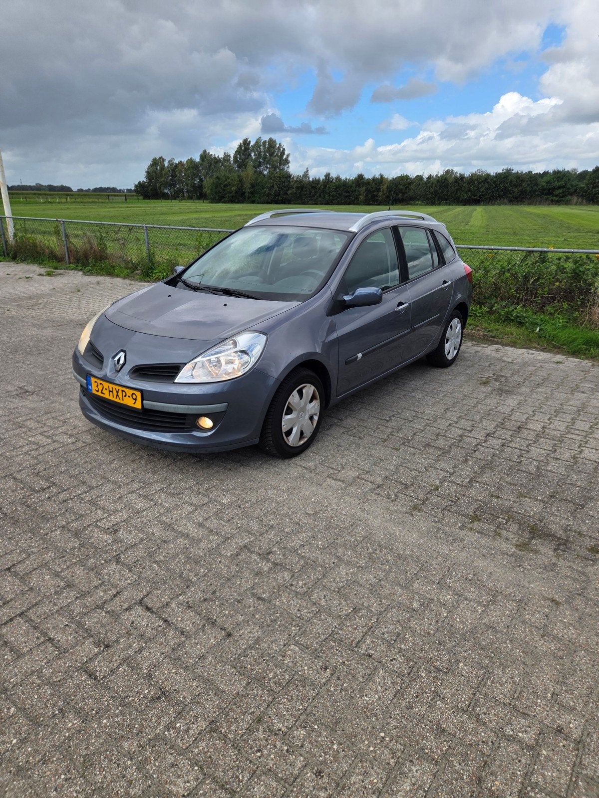 Renault Clio 1.6 16V 82KW Estate 2009 Blauw, Auto's, Voorwielaandrijving, 1145 kg, 4 cilinders, Blauw