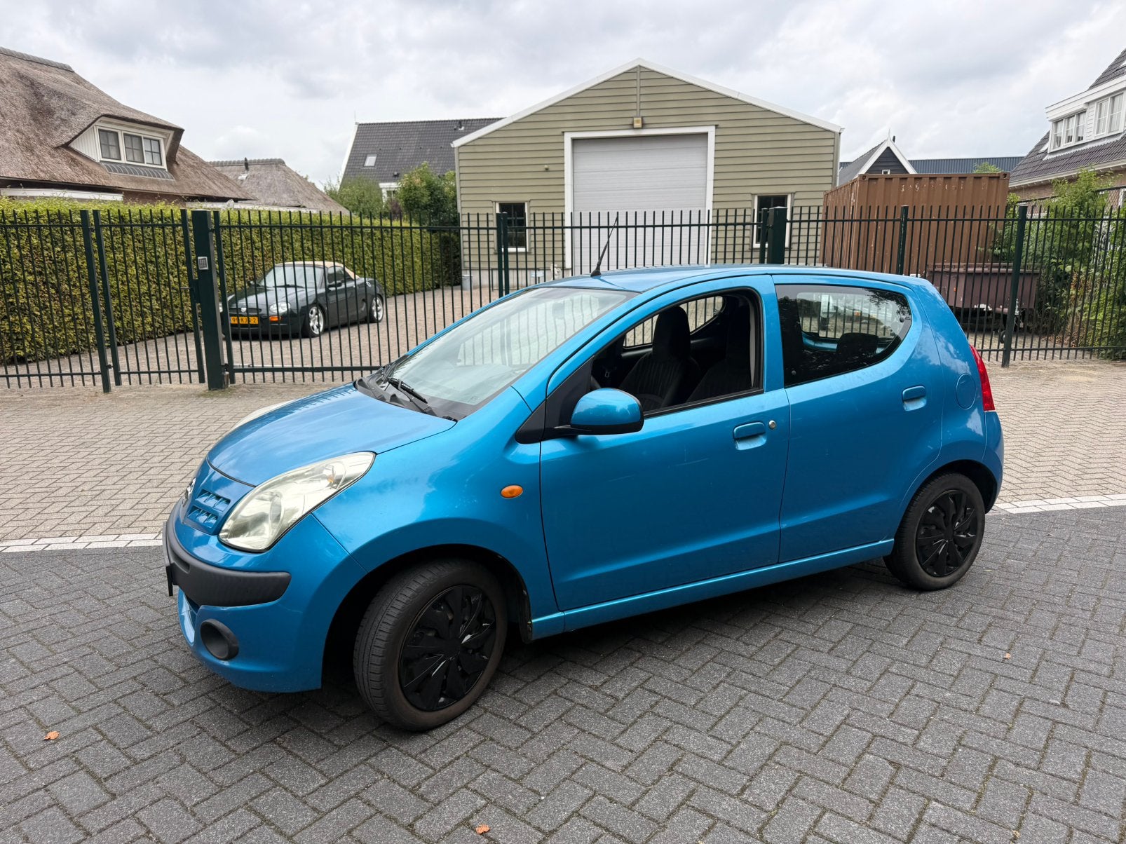 Nissan Pixo 1.0 50KW 5D 2011 Blauw nieuwe apk, Auto's, Voorwielaandrijving, Stof, 200 kg, Bedrijf