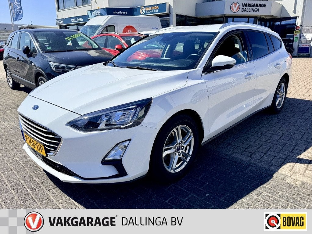 Ford FOCUS Wagon 1.0 EcoB. Tr Ed. bns (bj 2022), Auto's, Stof, Gebruikt, Euro 6, Wit