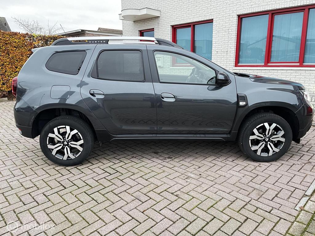 Dacia Duster 1.3 TCe AUTOMAAT/CAMERA/NAVI/CRUISE, Auto's, Dacia, Stof, Gebruikt, Zwart, 4 cilinders
