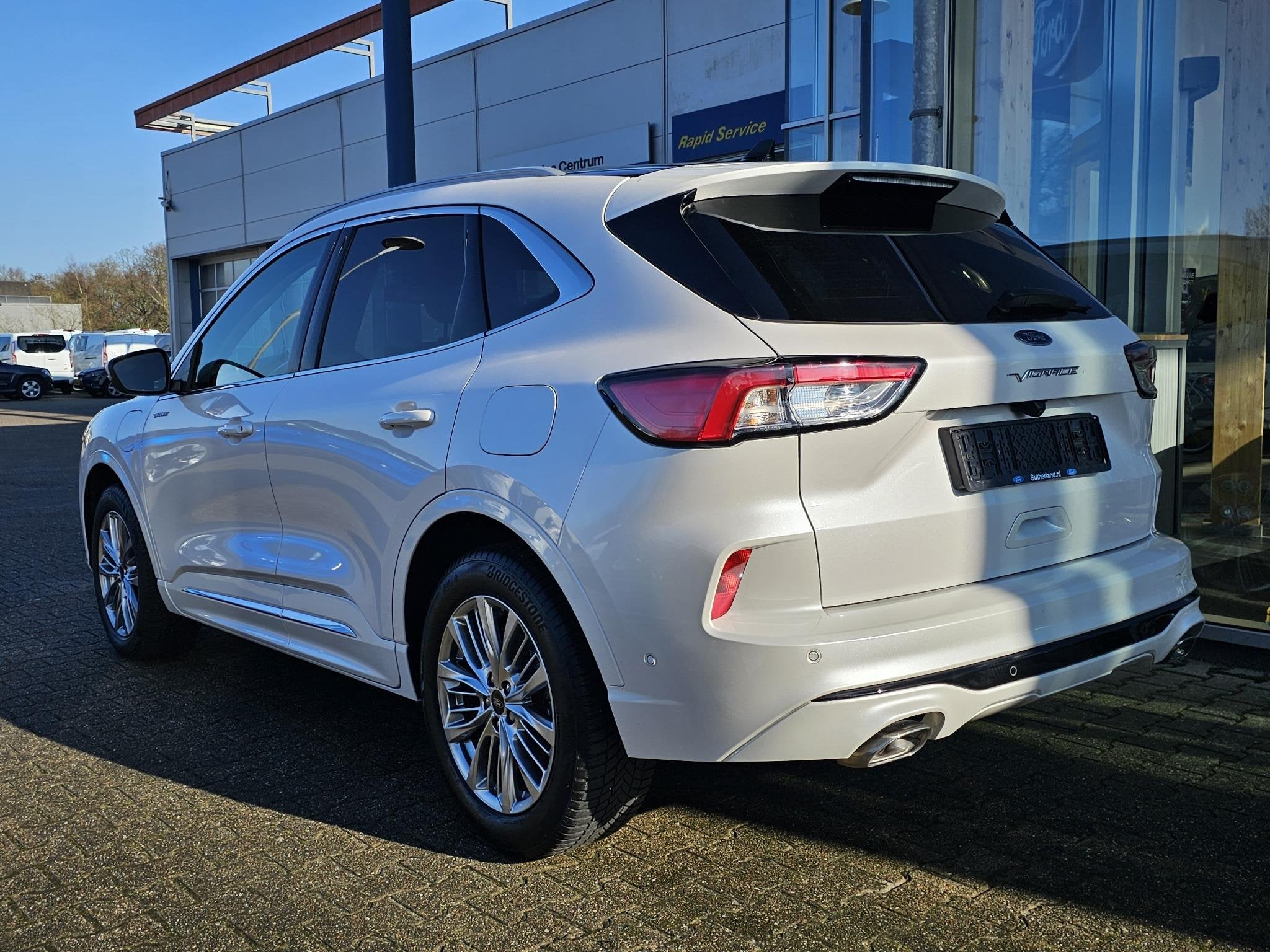 Ford Kuga 2.5 PHEV Vignale Panoramadak | Lederen bekleding |, 14 kWh, Gebruikt, 4 cilinders, Lichtsensor