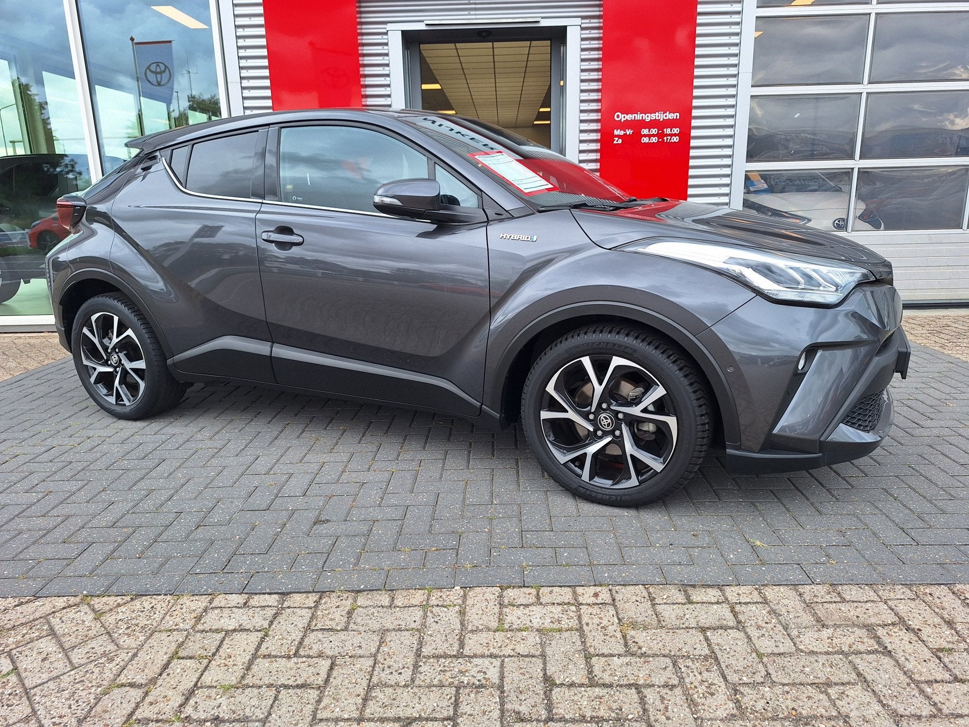 Toyota C-HR 1.8 Hybrid Style Limited (bj 2021, automaat), Auto's, 12 maanden, Stof, Euro 6, 4 cilinders