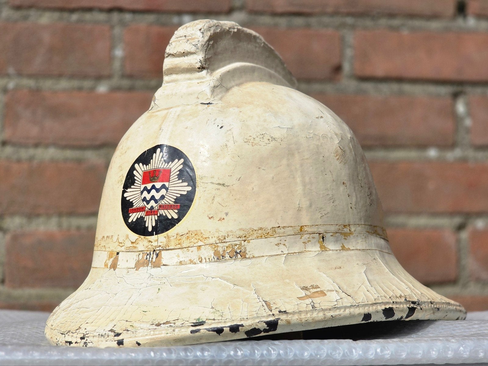 brandweerhelm brandweer Engeland London, Ophalen of Verzenden, Landmacht, Nederland, Embleem of Badge