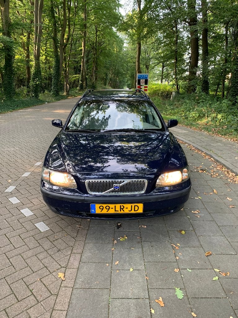 Volvo V70 2.4 140PK 2003 Blauw jong timer, Auto's, Volvo, Voorwielaandrijving, Parkeersensor, Stof, 1800 kg