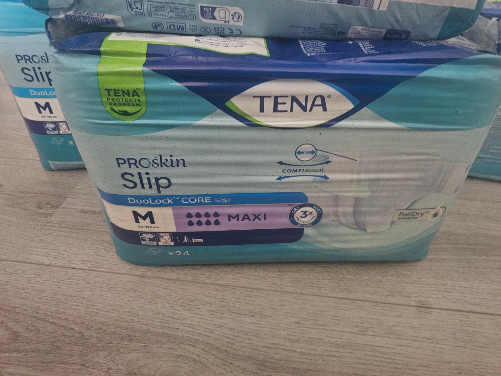 5 pakken Tena luiers maat M, Ophalen