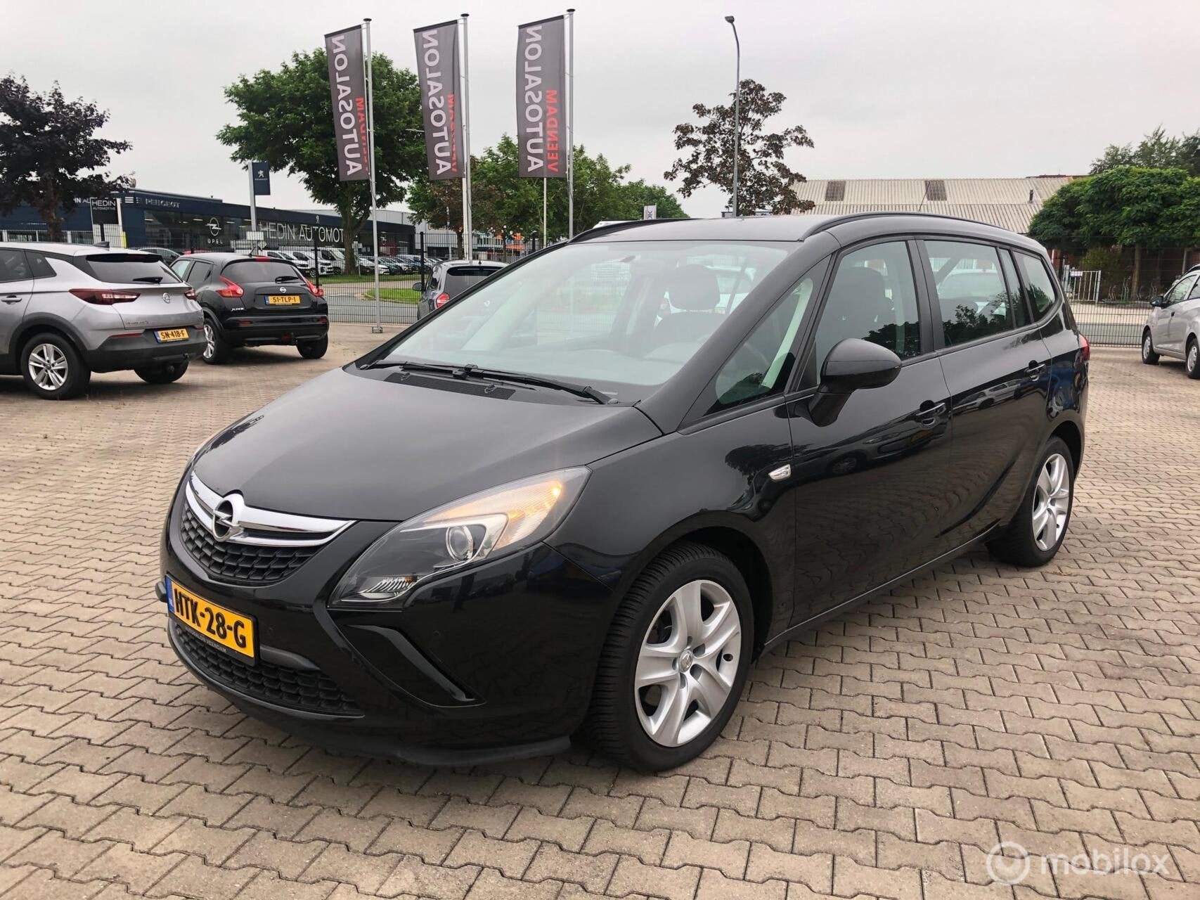 Opel Zafira Tourer 1.4 TURBO 140PK AIRCO CRUISE ELL PAK PDC, Auto's, Voorwielaandrijving, Euro 5, Stof, Zwart