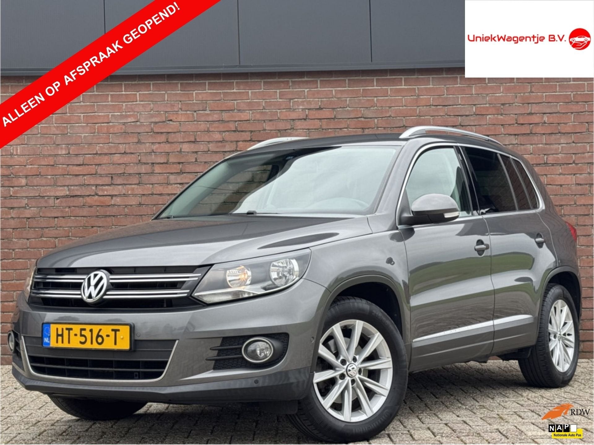 Volkswagen Tiguan 1.4 TSI SPORT&STYLE | NL-AUTO! | DEALER OH, Auto's, Voorwielaandrijving, Euro 5, 15 km/l, Gebruikt