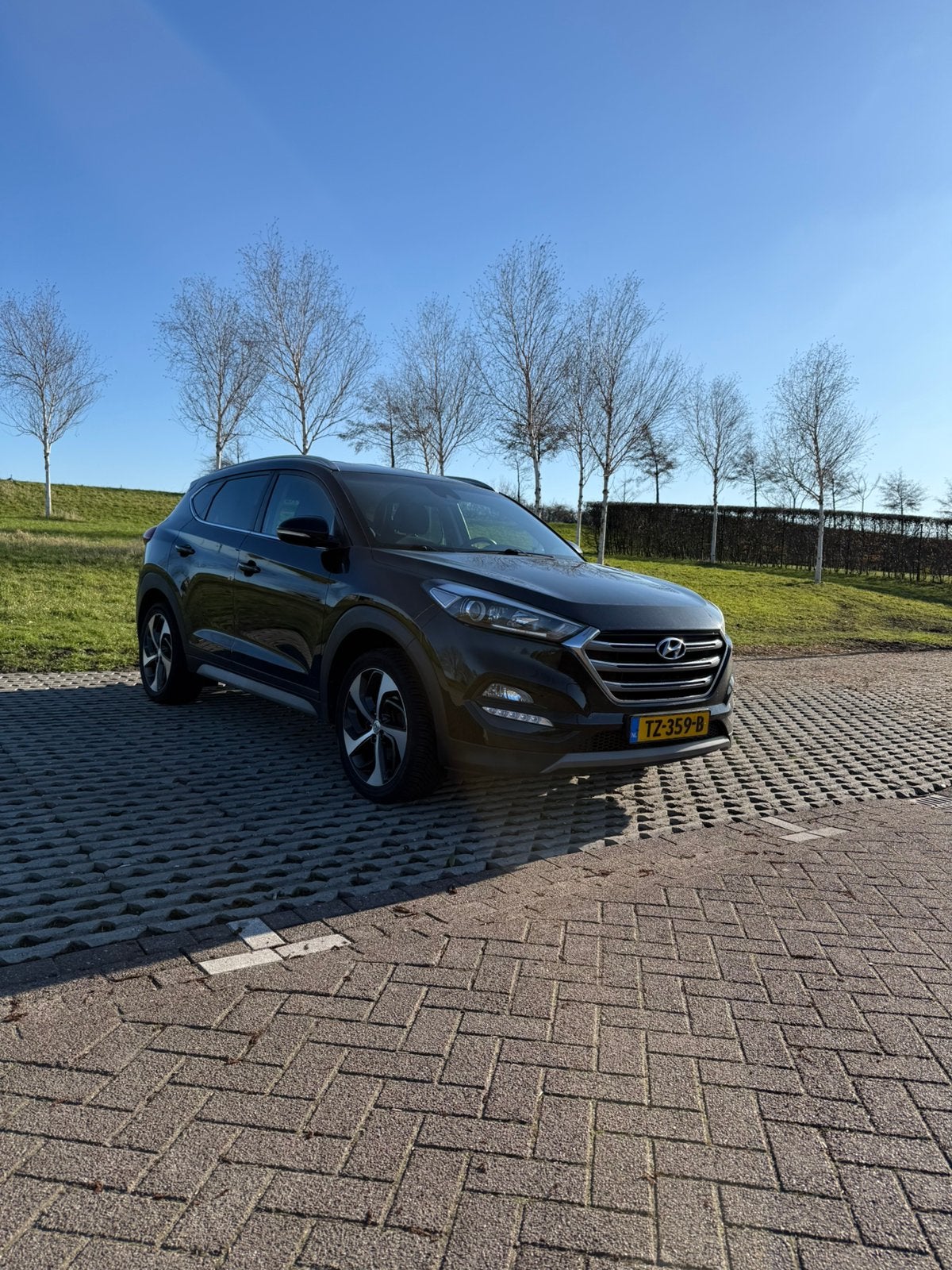 Hyundai Tucson 1.6 GDi 2018 carplay 19” trekhaak allseasons, Voorwielaandrijving, 4 cilinders, Origineel Nederlands, 75 €/maand