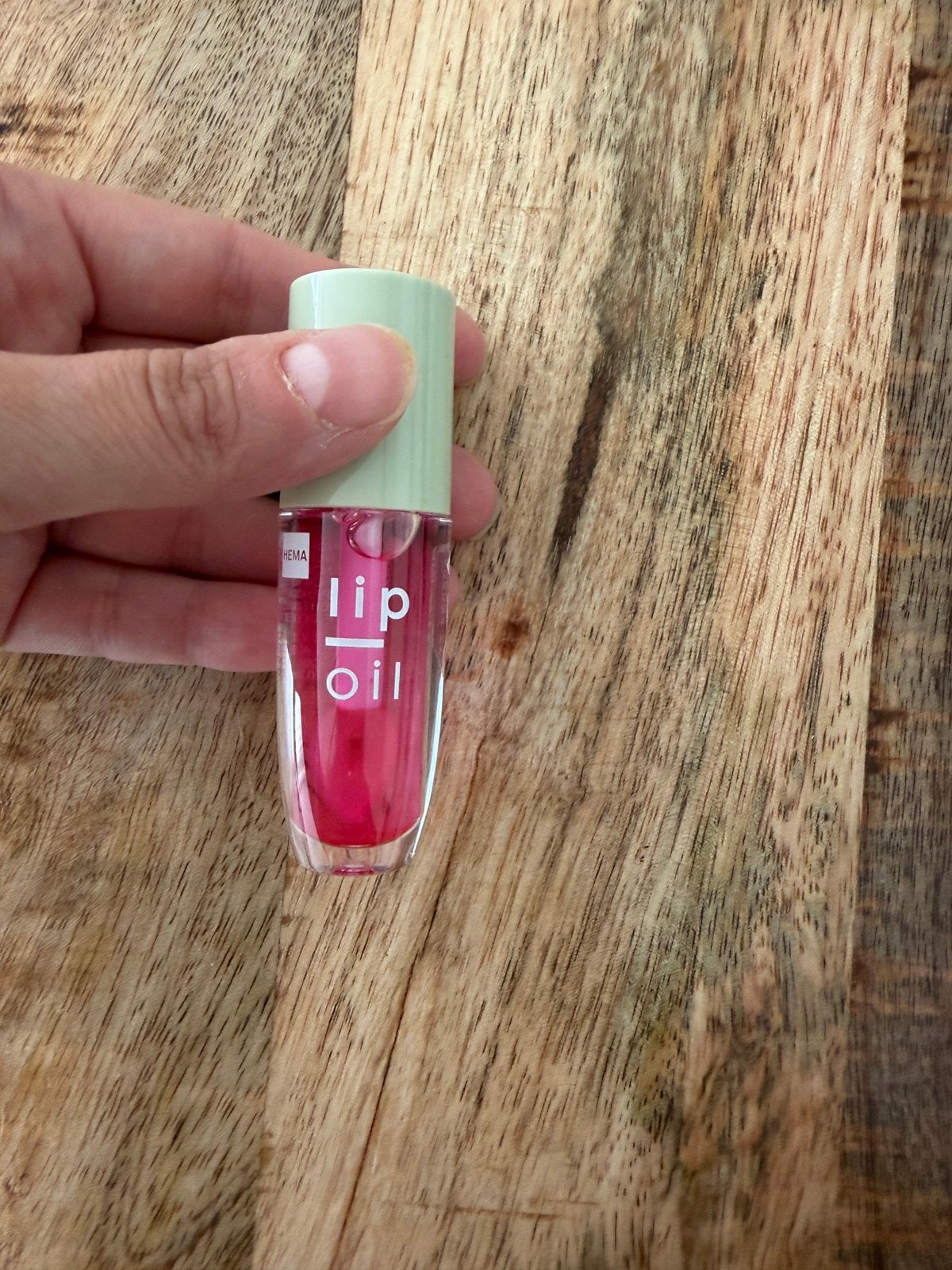 Hema lip oil, Ophalen of Verzenden, Zo goed als nieuw, Roze, Lippen