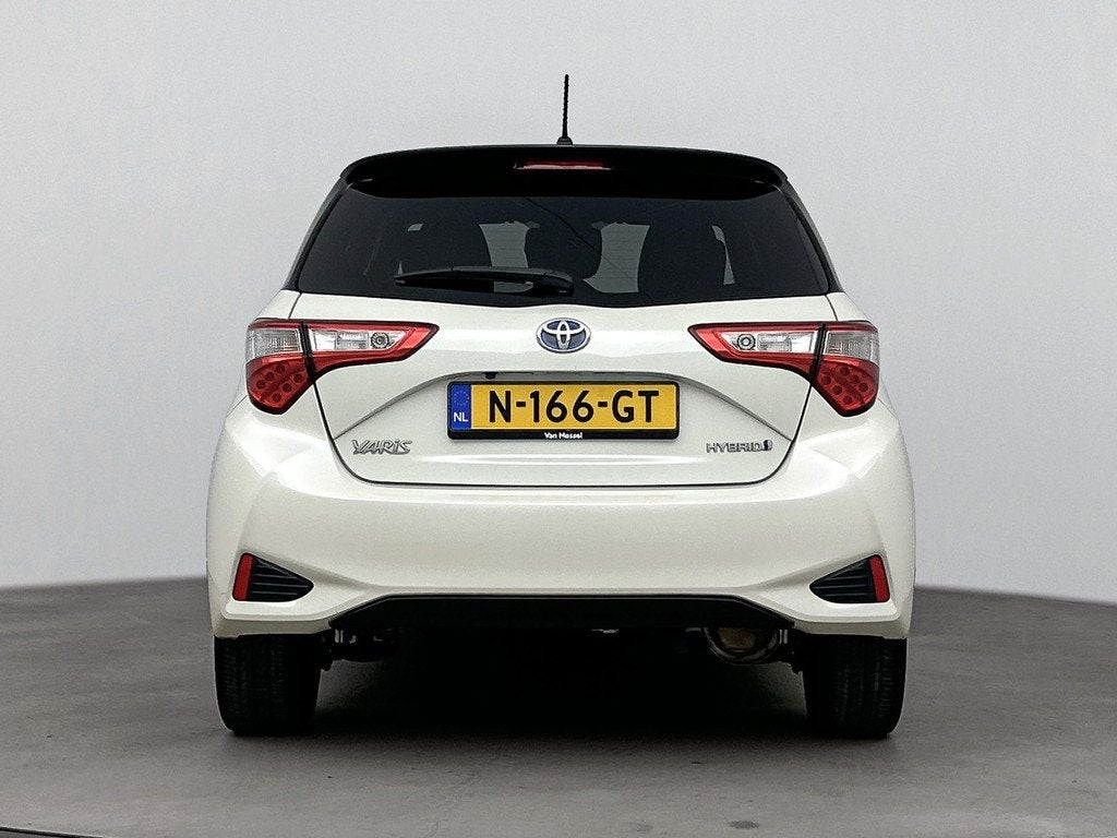 Toyota Yaris 1.5 Hybrid 100Pk Bi-Tone | Airco | Achteruitrij, Gebruikt, 4 cilinders, Bedrijf, Hybride Elektrisch/Benzine