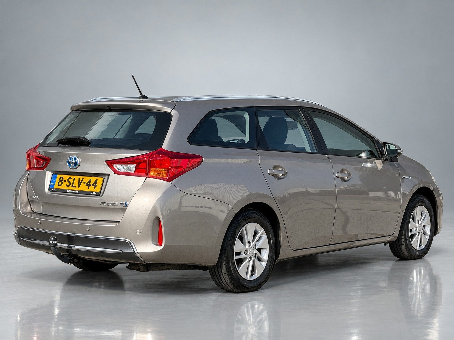 Toyota Auris Touring Sports 1.8 Hybrid Aspiration|Navigatie|, Auto's, Stof, Gebruikt, Zwart, Bruin