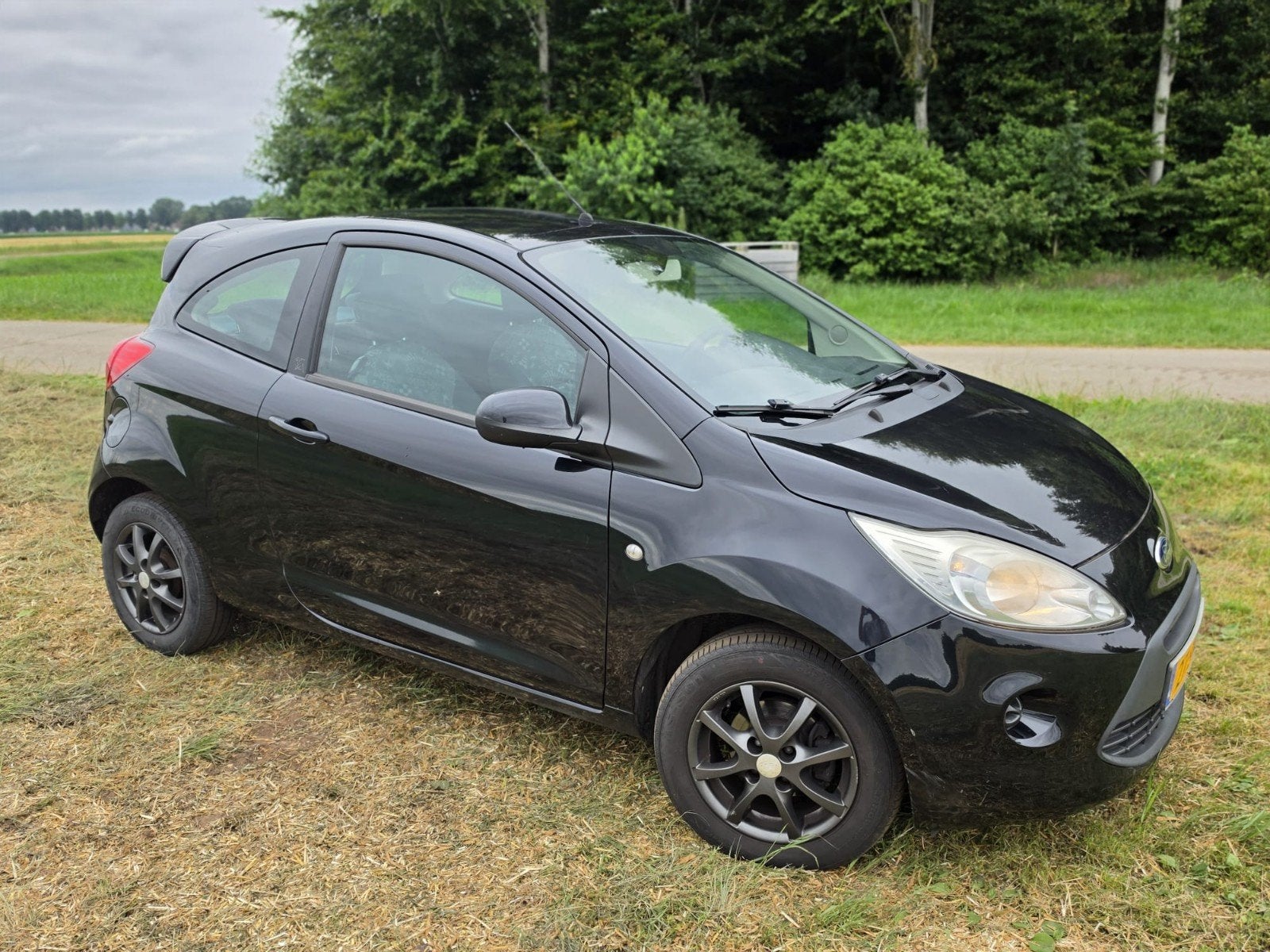 Ford Ka 1.2 69pk 2011 Zwart, Auto's, Ford, Voorwielaandrijving, 1242 cc, 4 cilinders, 4 stoelen