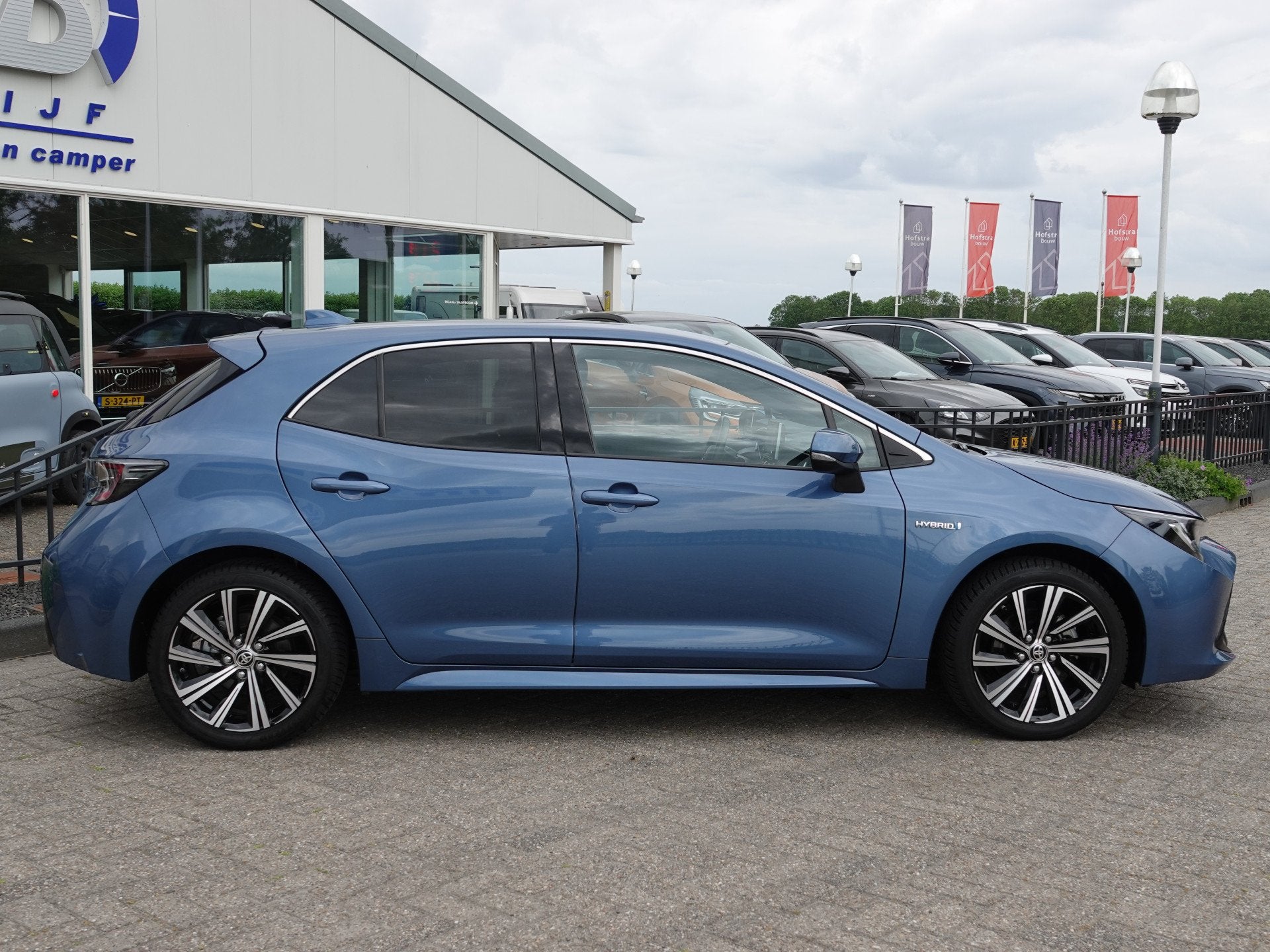 Toyota Corolla 1.8 Hybrid Business Plus H-LEER | CRUISE | LM, 450 kg, Gebruikt, 4 cilinders, Blauw