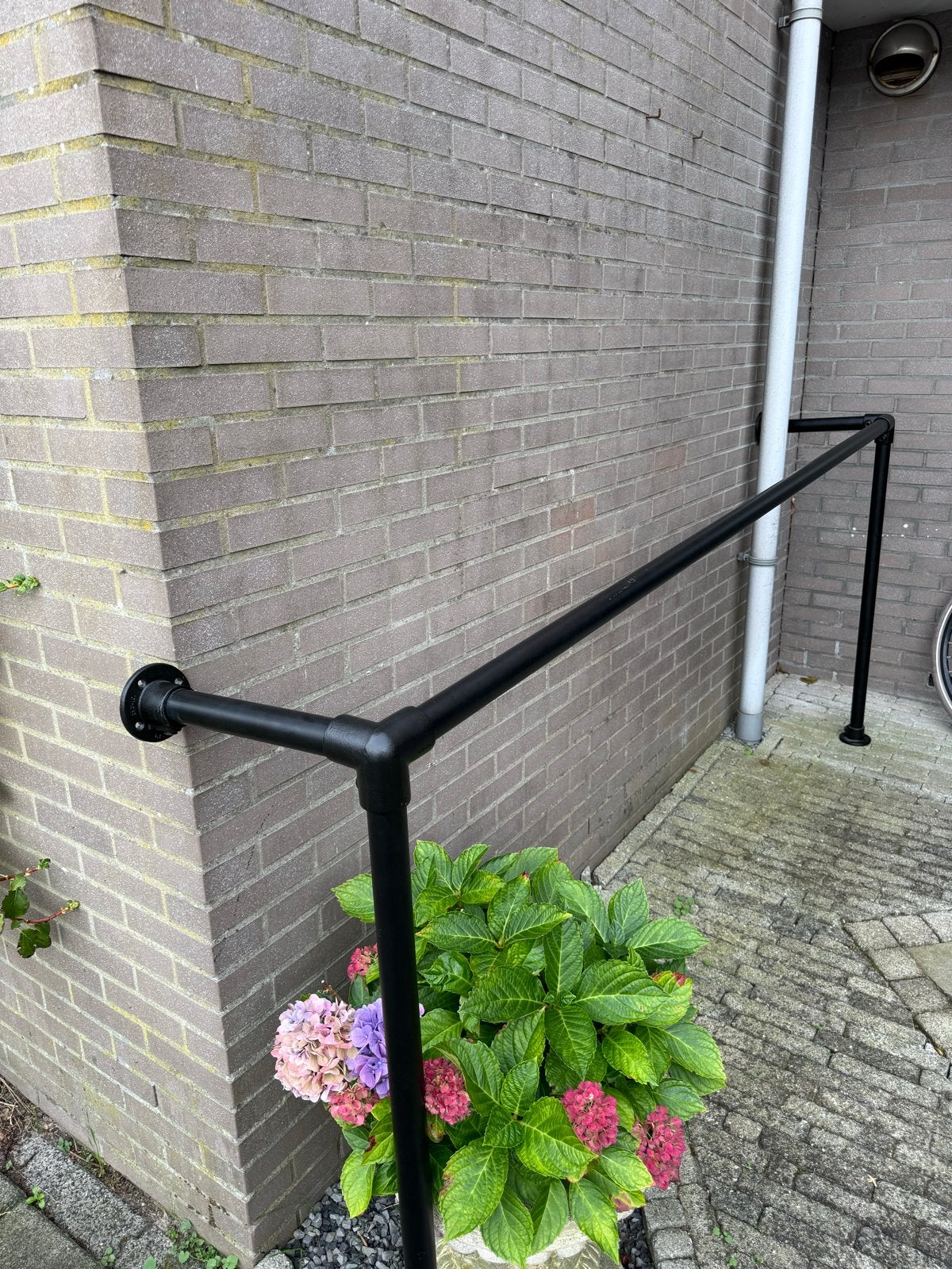 Kledingrek van steigerbuis, Ophalen, Gebruikt