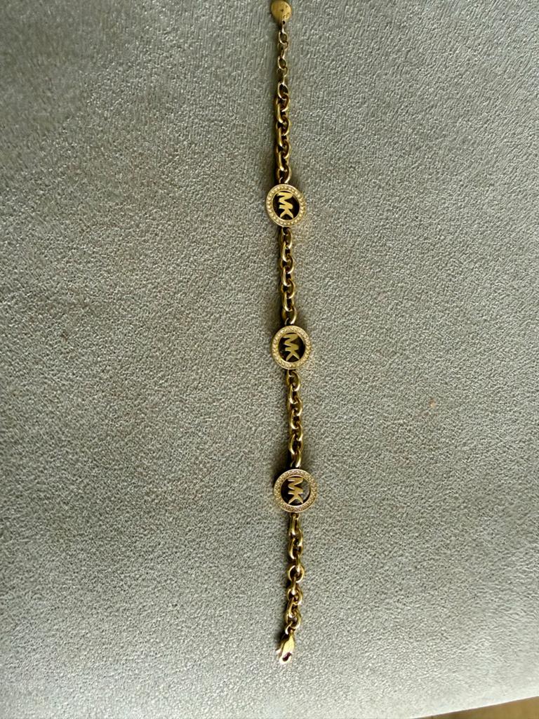 Michael Kors Armband Goudkleurig met MK Logo en Strass, Ophalen of Verzenden, Zo goed als nieuw