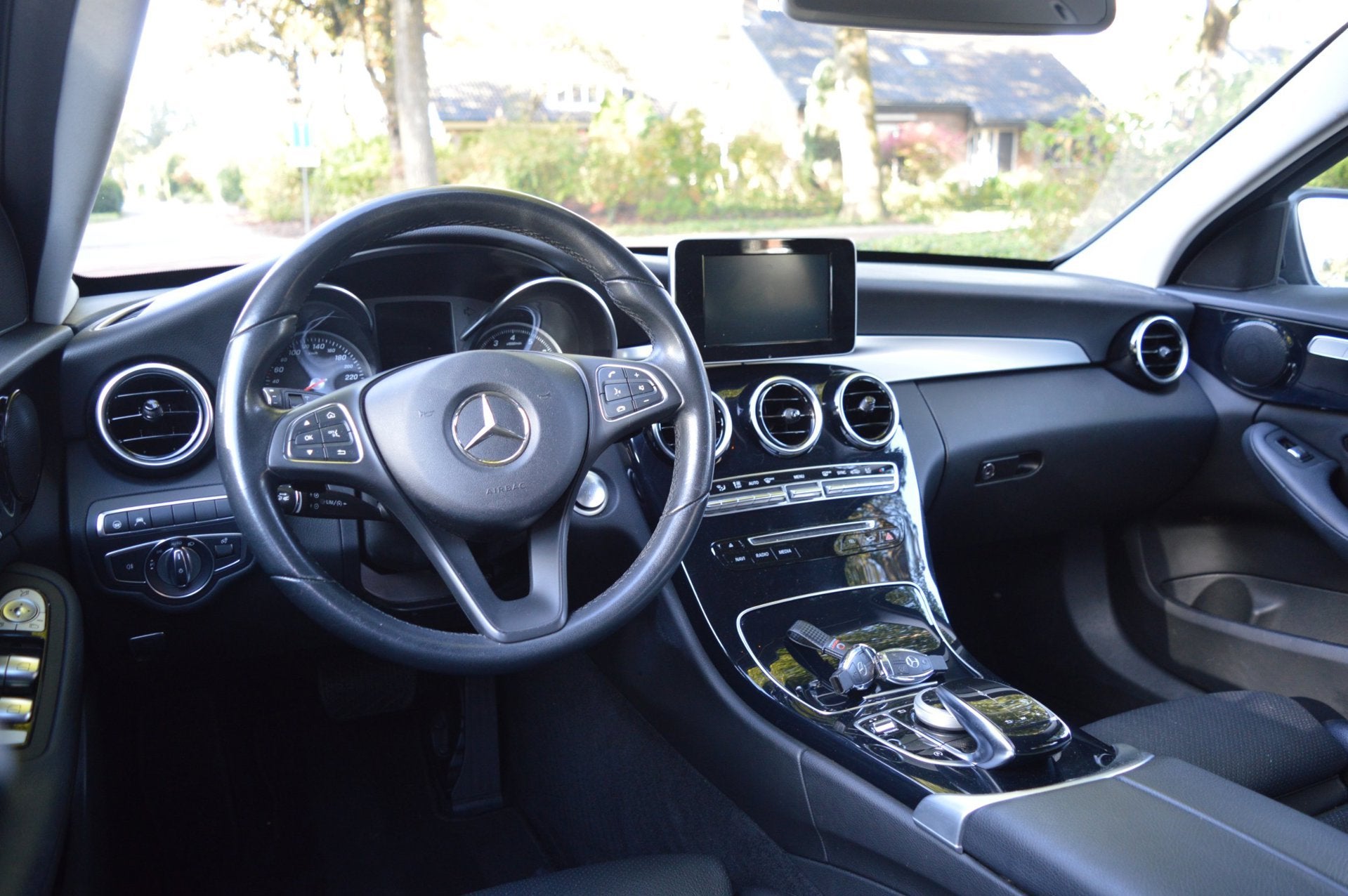 Mercedes-Benz C-klasse Estate 200 Prestige AMG-styling /navi, Automaat, Achterwielaandrijving, 4 cilinders, Zwart