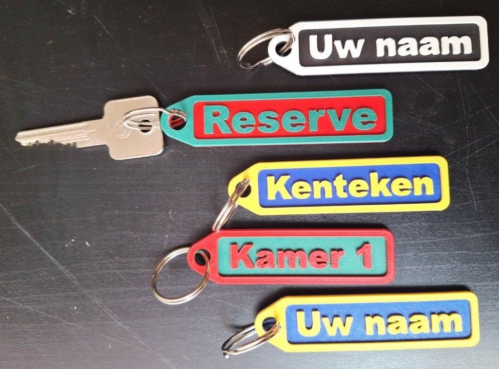 Uniek Naamlabel - Sleutelhanger in kleur, Ophalen of Verzenden, Nieuw, Overige typen