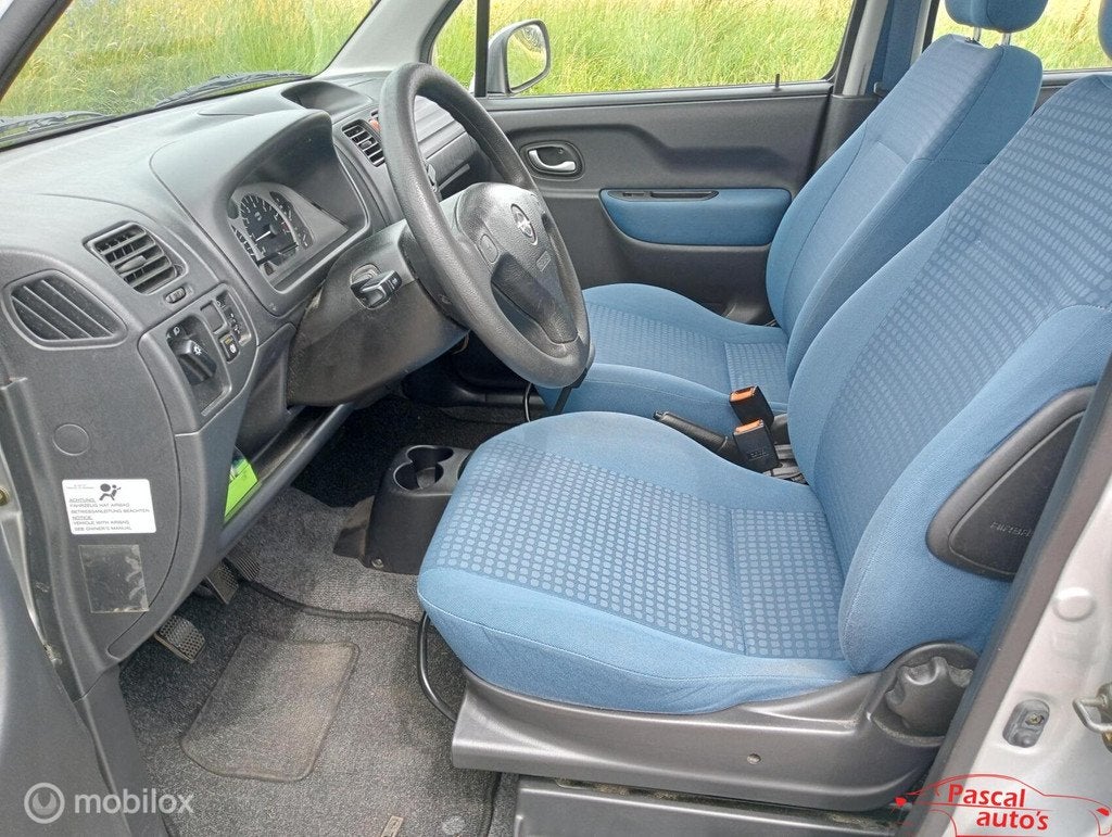 Opel Agila 1.2-16V Enjoy airco nw apk hoge instap, Auto's, Voorwielaandrijving, Elektrische ramen, Stof, Origineel Nederlands