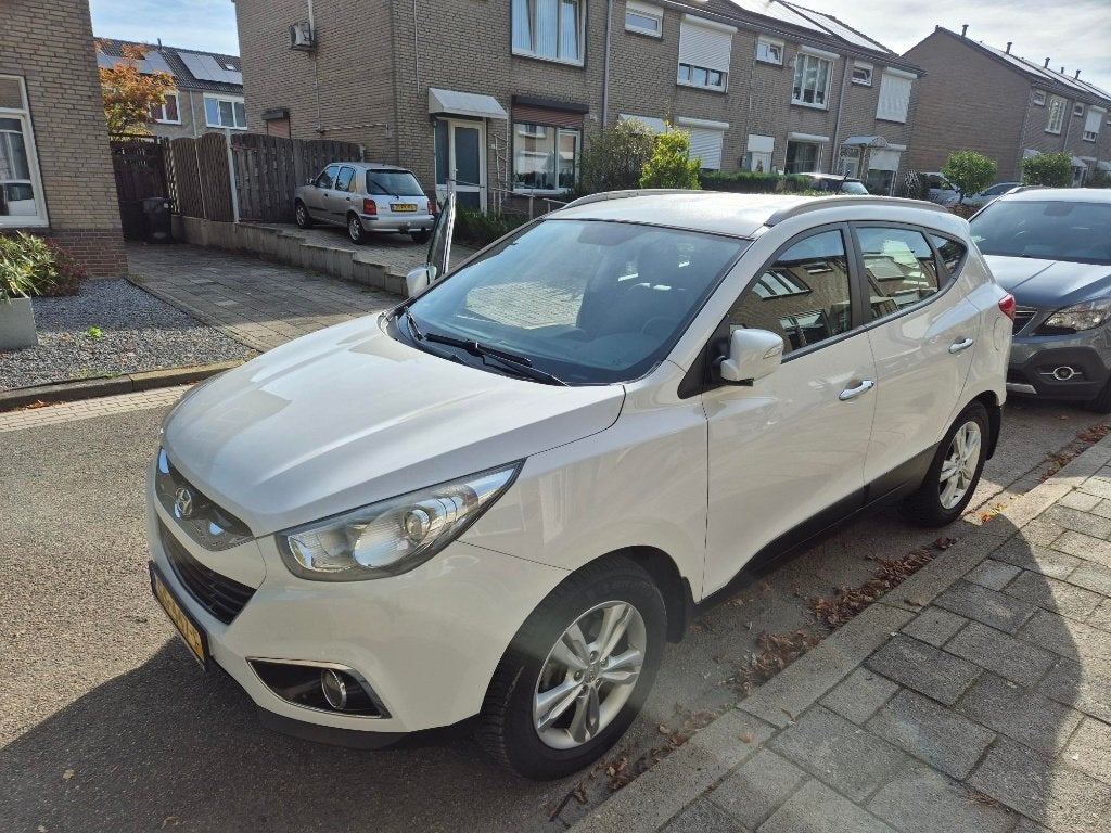 Hyundai iX35 1.6 GDI 2WD 2012 Wit, Auto's, Voorwielaandrijving, 1280 kg, 1591 cc, 4 cilinders