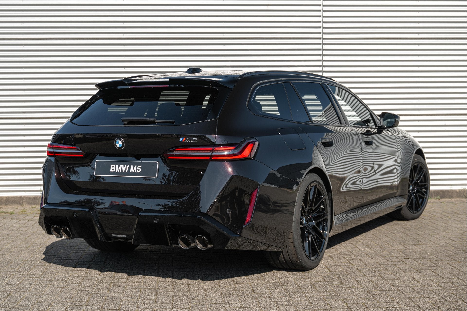 BMW 5 Serie Touring M5 Automaat / Trekhaak / Panoramadak / C, Auto's, 4395 cc, Zwart, Leder, Hybride Elektrisch/Benzine