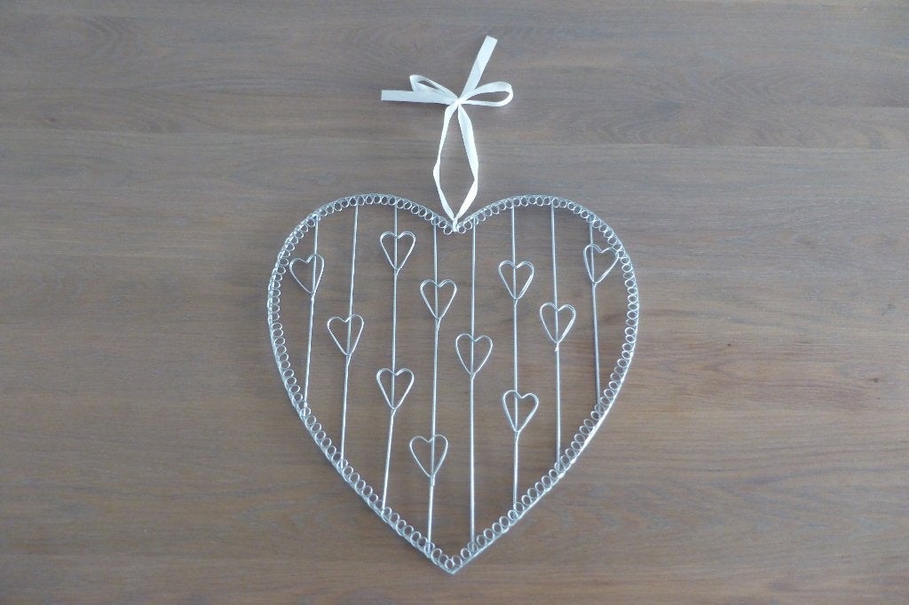 Metalen wanddecoratie hart met strik, Metaal, Zilver, Decoratieobject, Ophalen of Verzenden