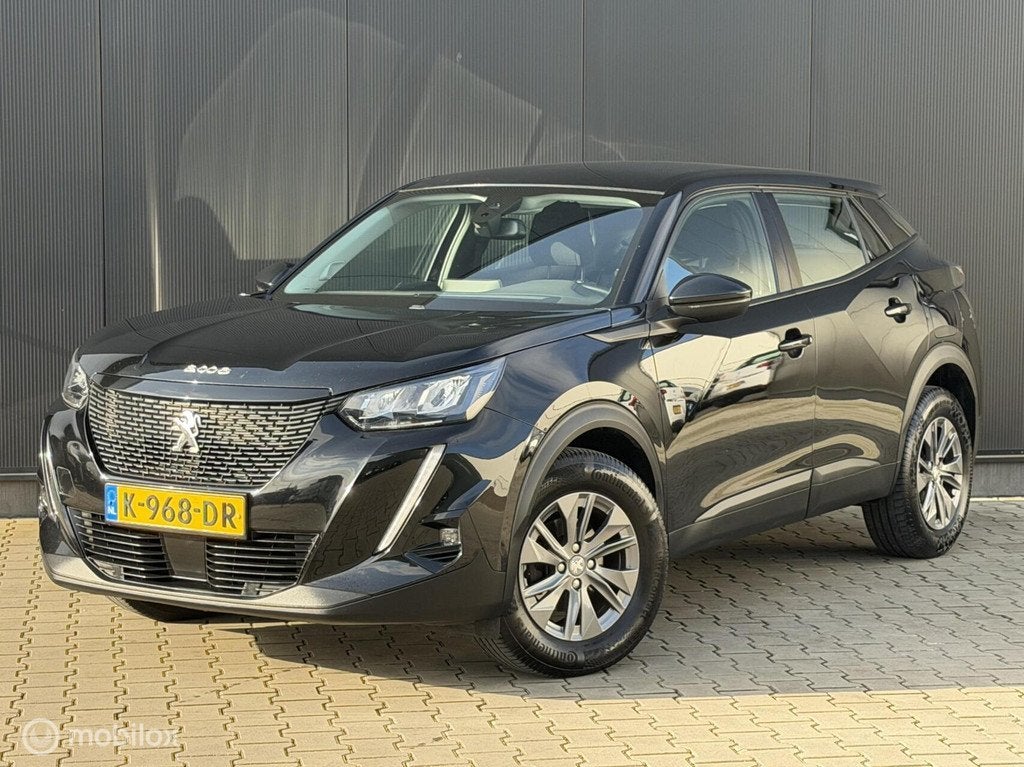 Peugeot 2008 1.2 131PK Active | CRUISE | AUTOMAAT | TREKHAAK, Stof, Gebruikt, 1199 cc, Zwart