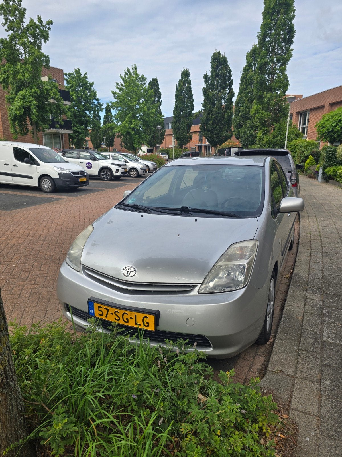 Toyota Prius 1.5 HSD 2006 Grijs, Auto's, Toyota, 4 cilinders, 23 km/l, Origineel Nederlands, Grijs