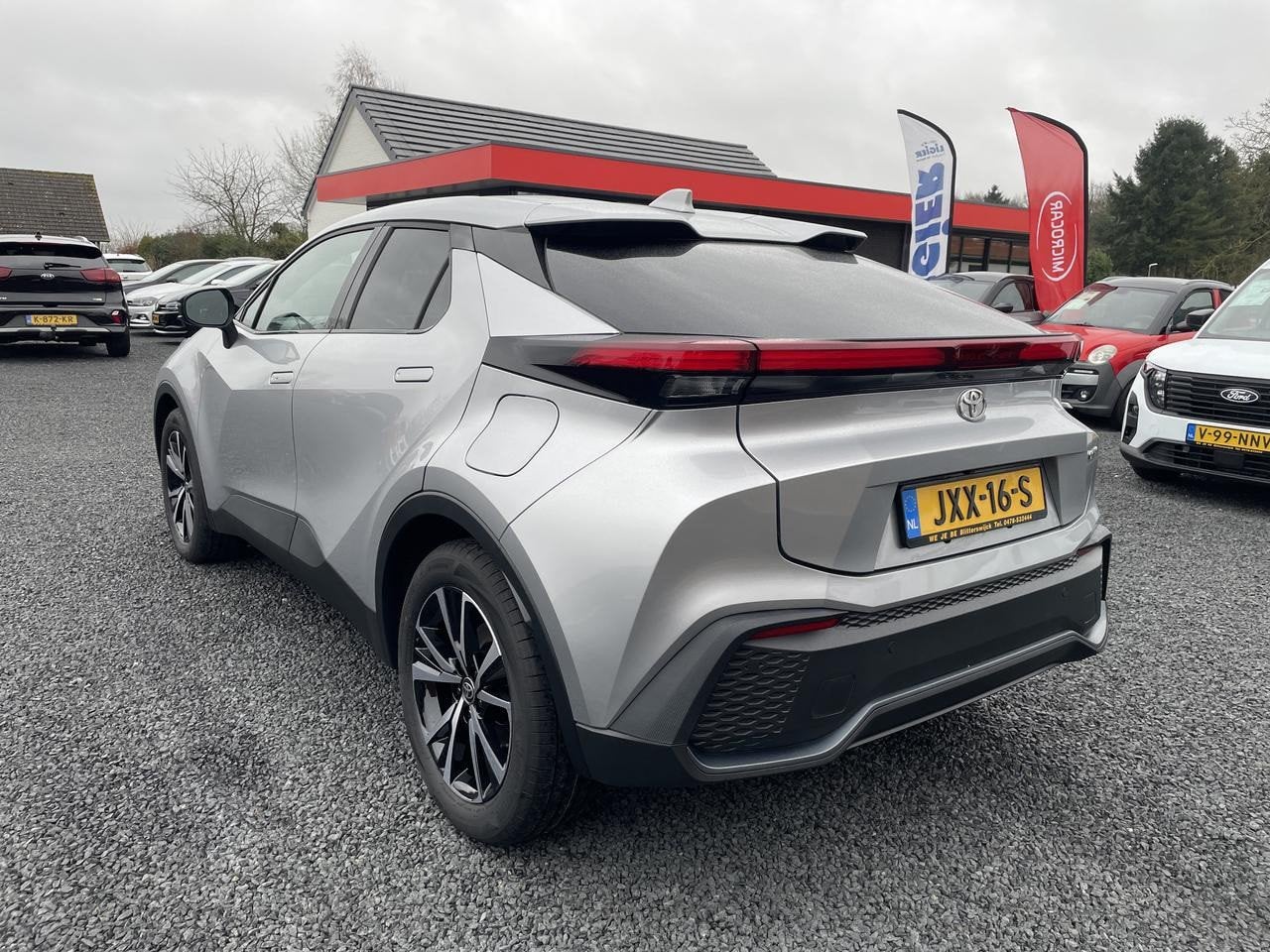 Toyota C-HR PHEV 2.0 PLUG-IN HYBRID 220 DYNAMIC (bj 2025), Auto's, Stof, Zwart, 4 cilinders, Met garantie (alle)