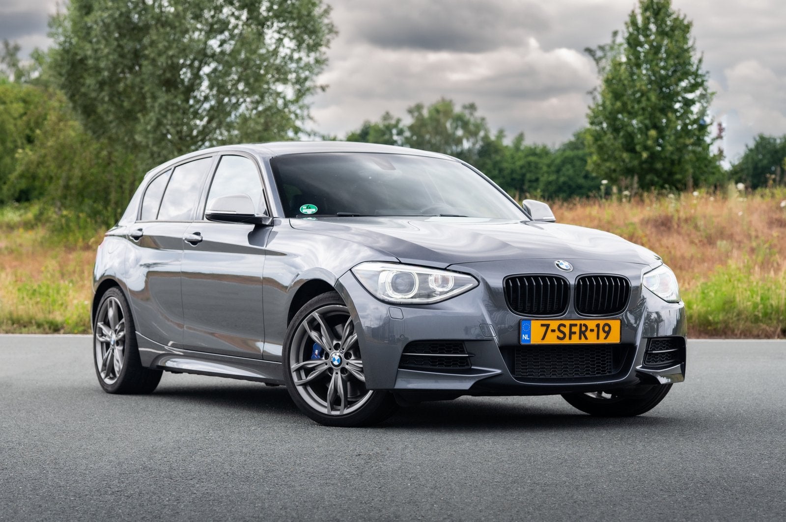 BMW M135i X-Drive | Volledig Dealer OH | Origineel NL |, Auto's, BMW, Zwart, 320 pk, Vierwielaandrijving, Particulier