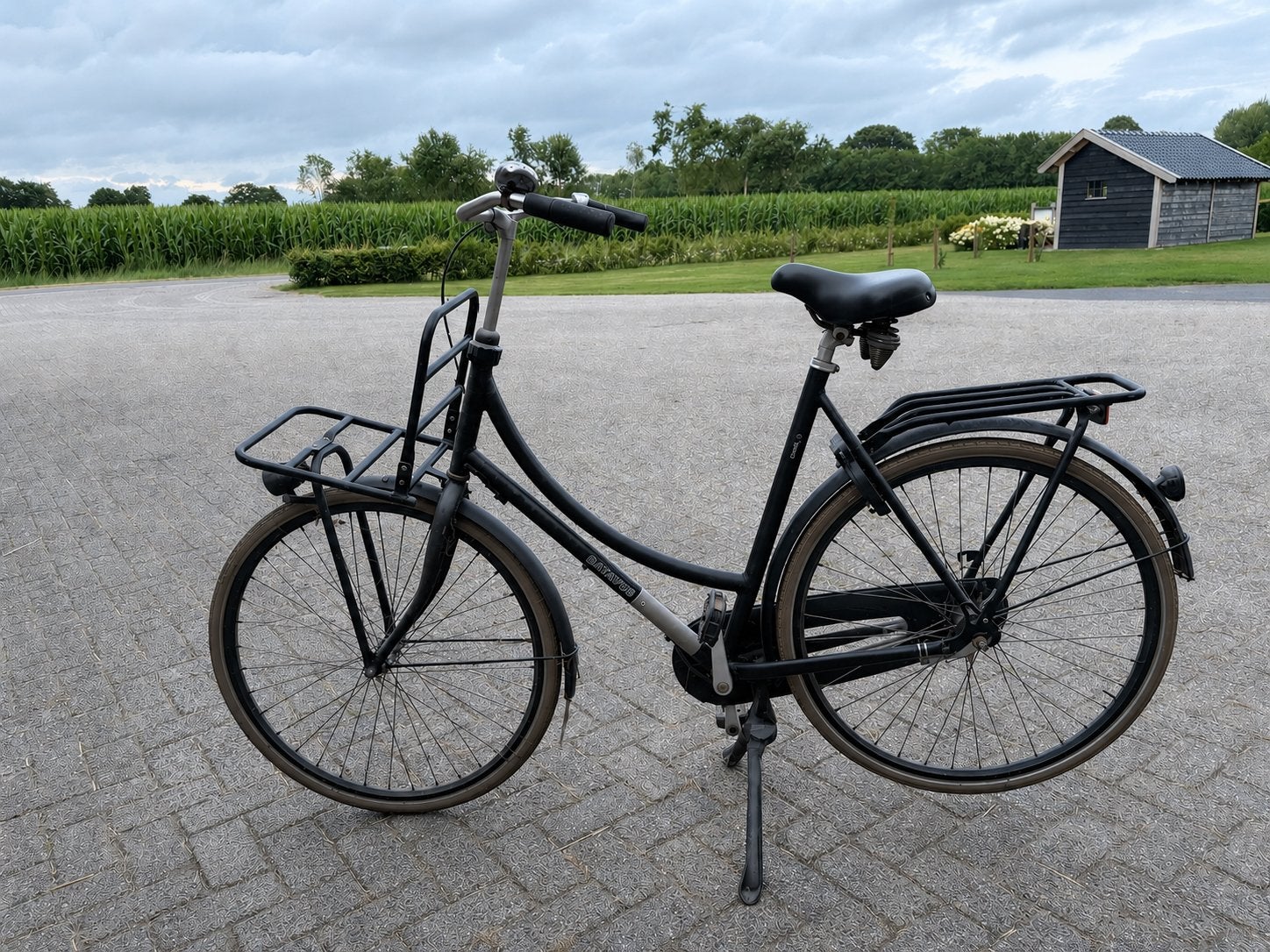 Zwarte Batavus damesfiets met voordrager, Ophalen, Terugtraprem, Batavus, 53 tot 56 cm