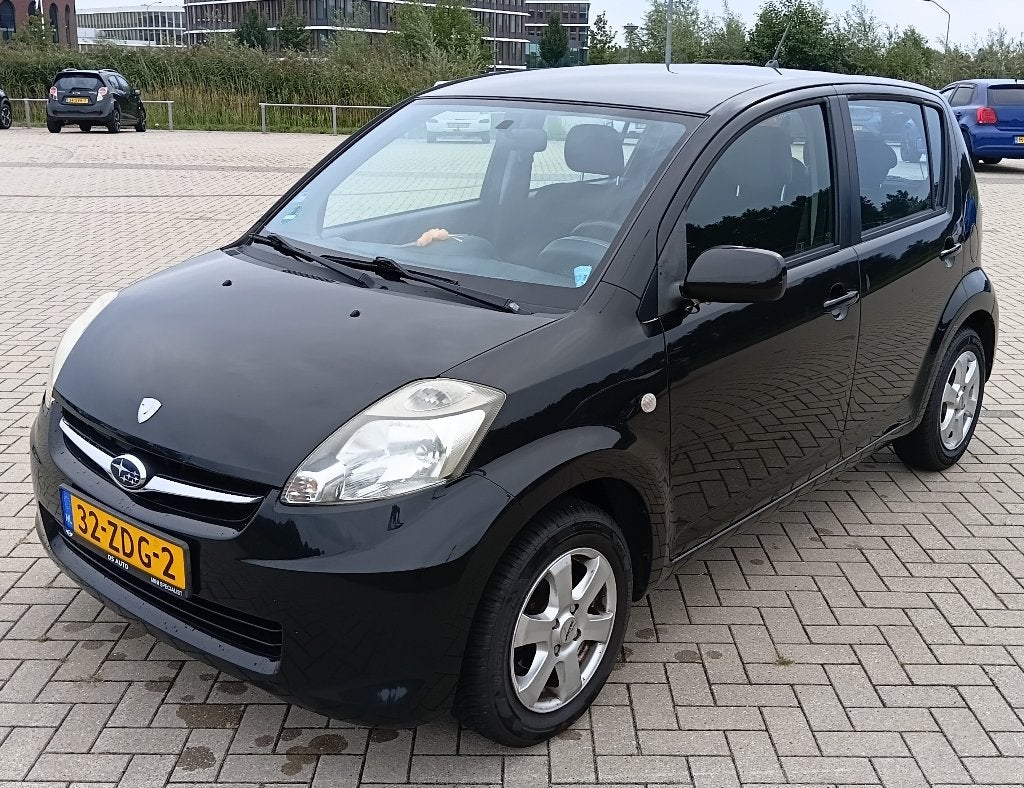 Subaru Justy 1.0 Airco/Elektr. ramen & spiegels/APK 10-2027, Auto's, Voorwielaandrijving, Justy, Stof, Zwart