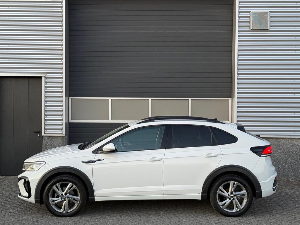 Volkswagen Taigo 1.0 TSI R-Line IQ lampen Apple Car play, Voorwielaandrijving, 1131 kg, Gebruikt, Zwart