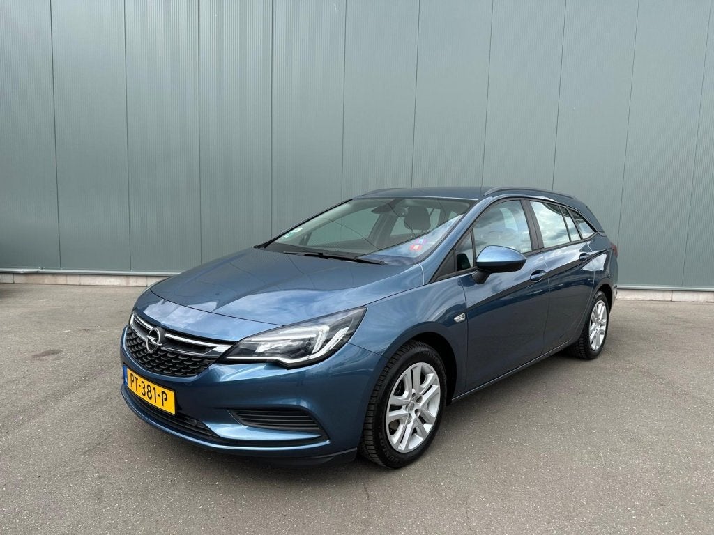 Opel Astra Sports Tourer 1.6 CDTI Online Ed. TREKHAAK | NAVI, Auto's, Voorwielaandrijving, Euro 6, 4 cilinders, Blauw