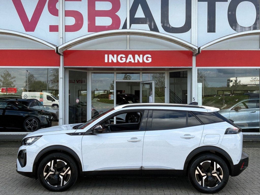 Peugeot E-2008 EV ALLURE 54 KWH 156PK GROTE-ACCU NL-AUTO NAV, Auto's, Automaat, Gebruikt, Huisgarantie, Wit