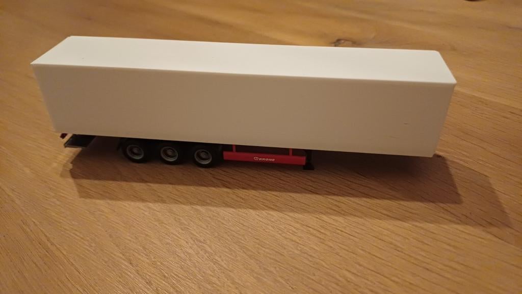 Herpa Krone gesloten trailer met laadklep, Hobby en Vrije tijd, Modelauto's | 1:87, Ophalen of Verzenden, Nieuw, Bus of Vrachtwagen