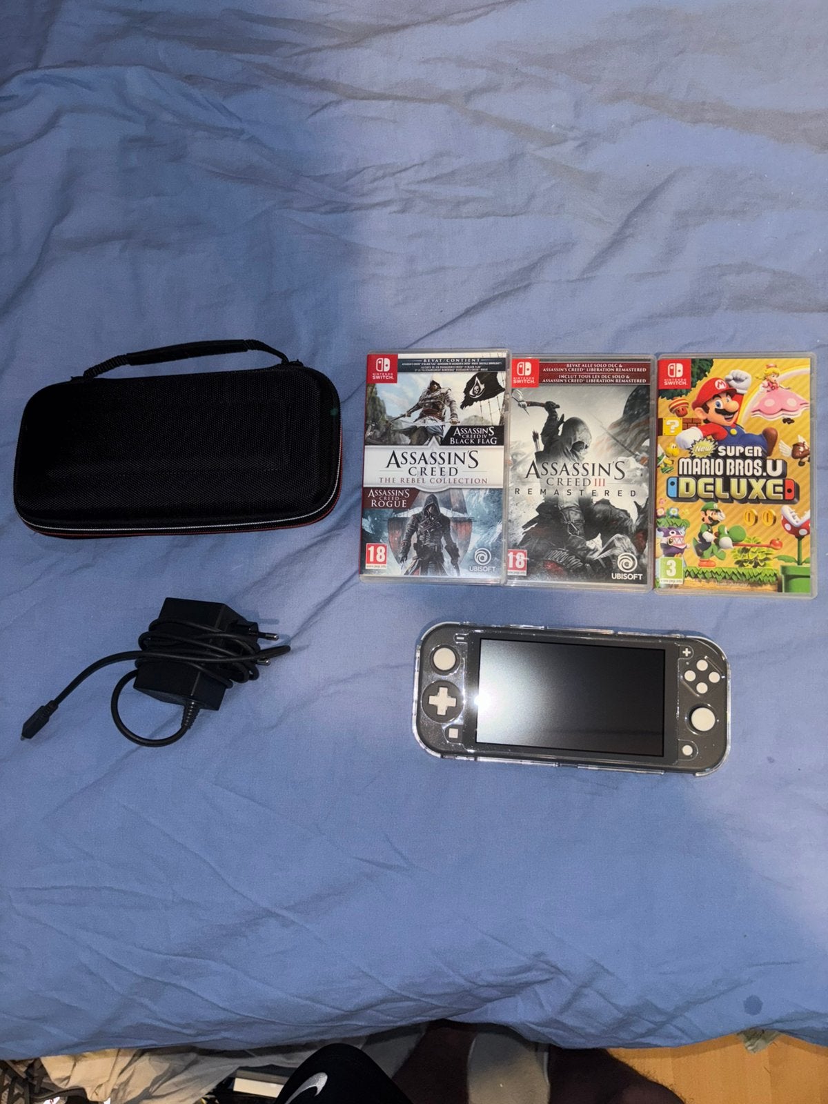 Nintendo Switch Lite met 3 games en accessoires., Spelcomputers en Games, Spelcomputers | Nintendo Switch Lite, Zo goed als nieuw