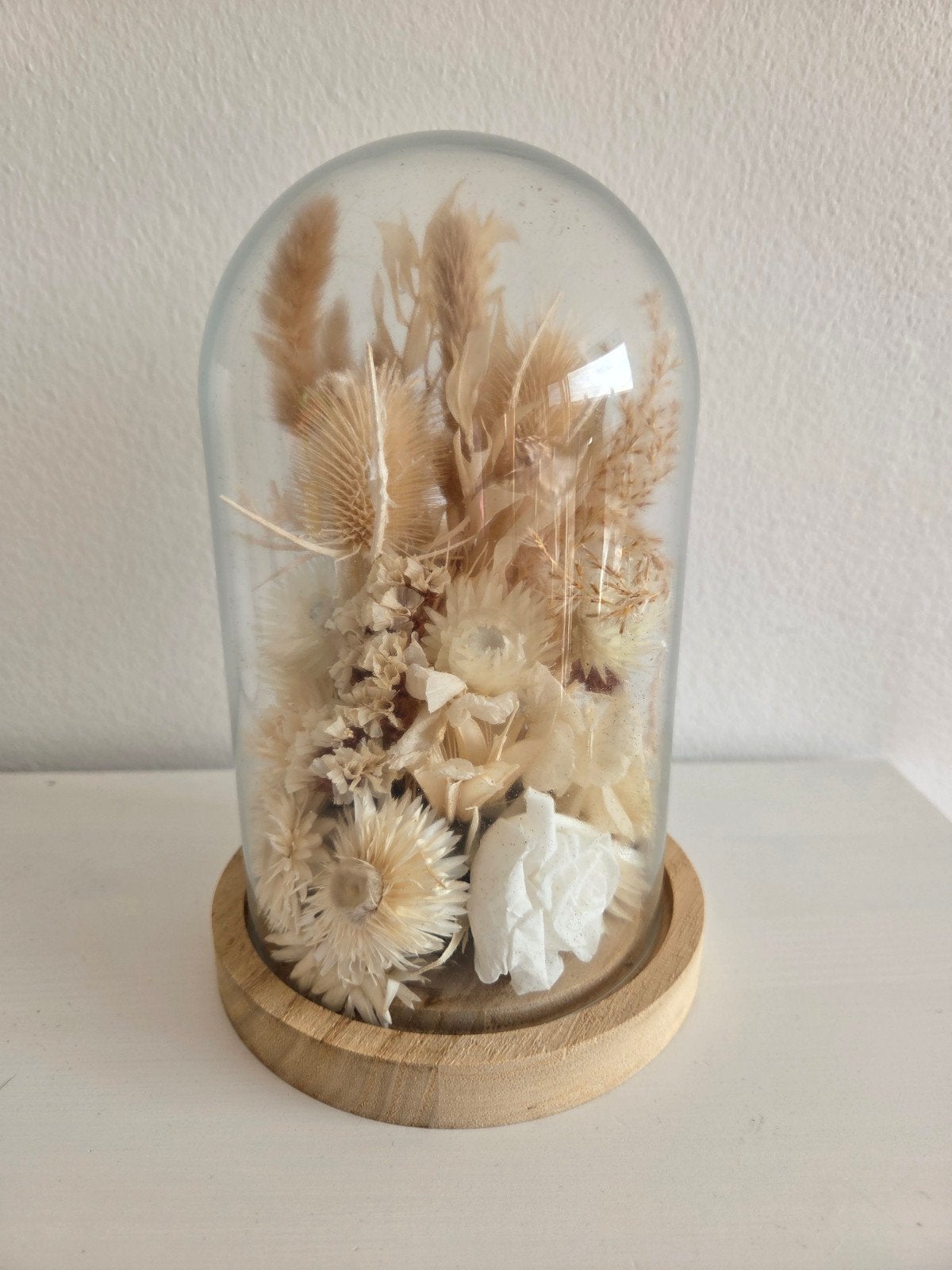 Leuke stolp met droogbloemen, Ophalen