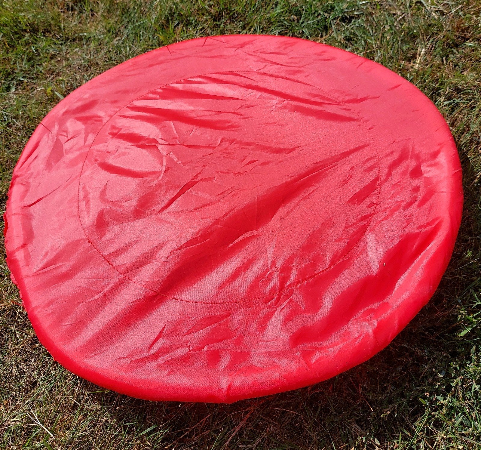 Frisbee rood, doorsnee 55cm, Ophalen of Verzenden, Zo goed als nieuw