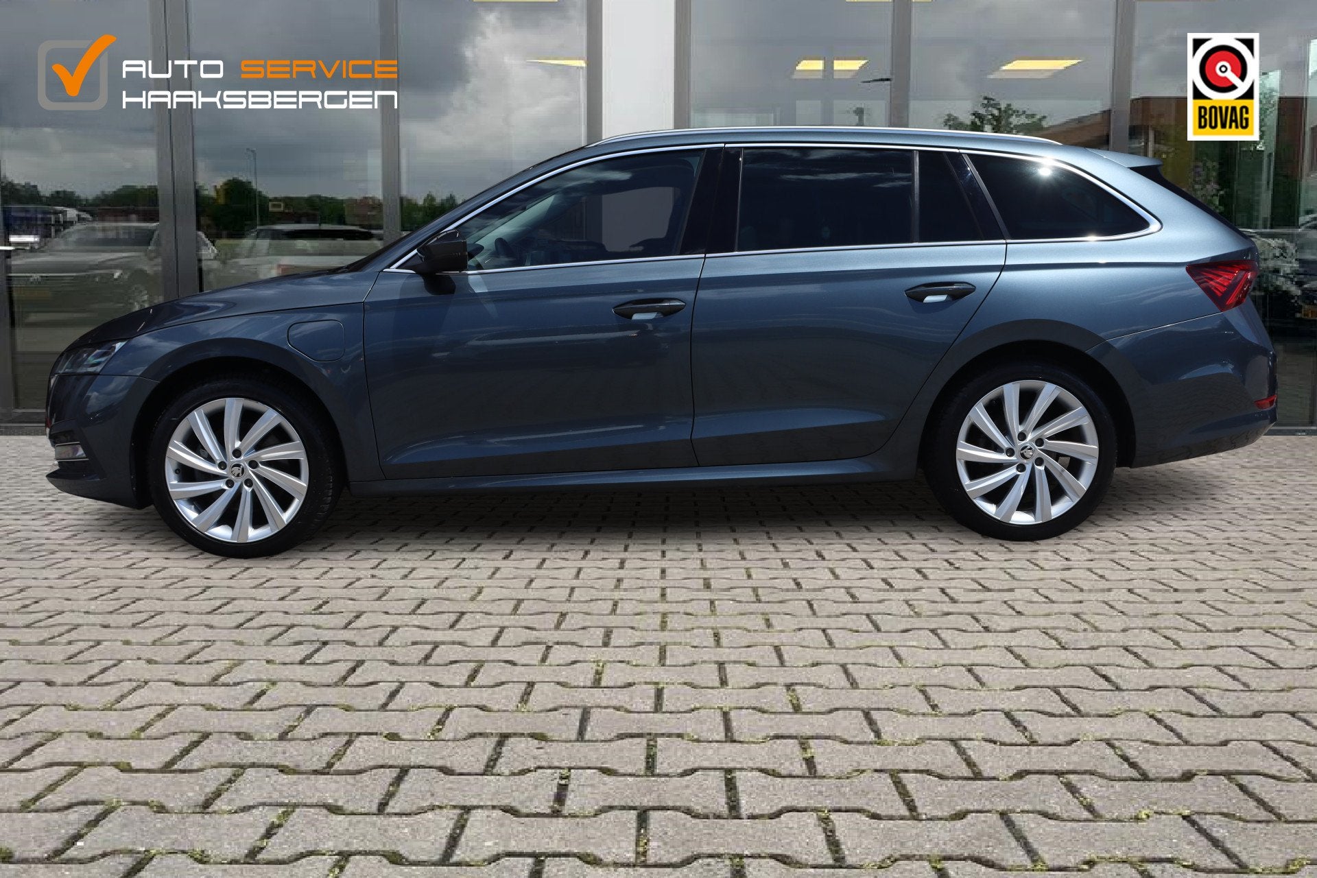 Skoda Octavia Combi 1.4 TSI iV PHEV Business Edition | ACC |, Gebruikt, Leder en Stof, Plug-in hybride, 1500 kg
