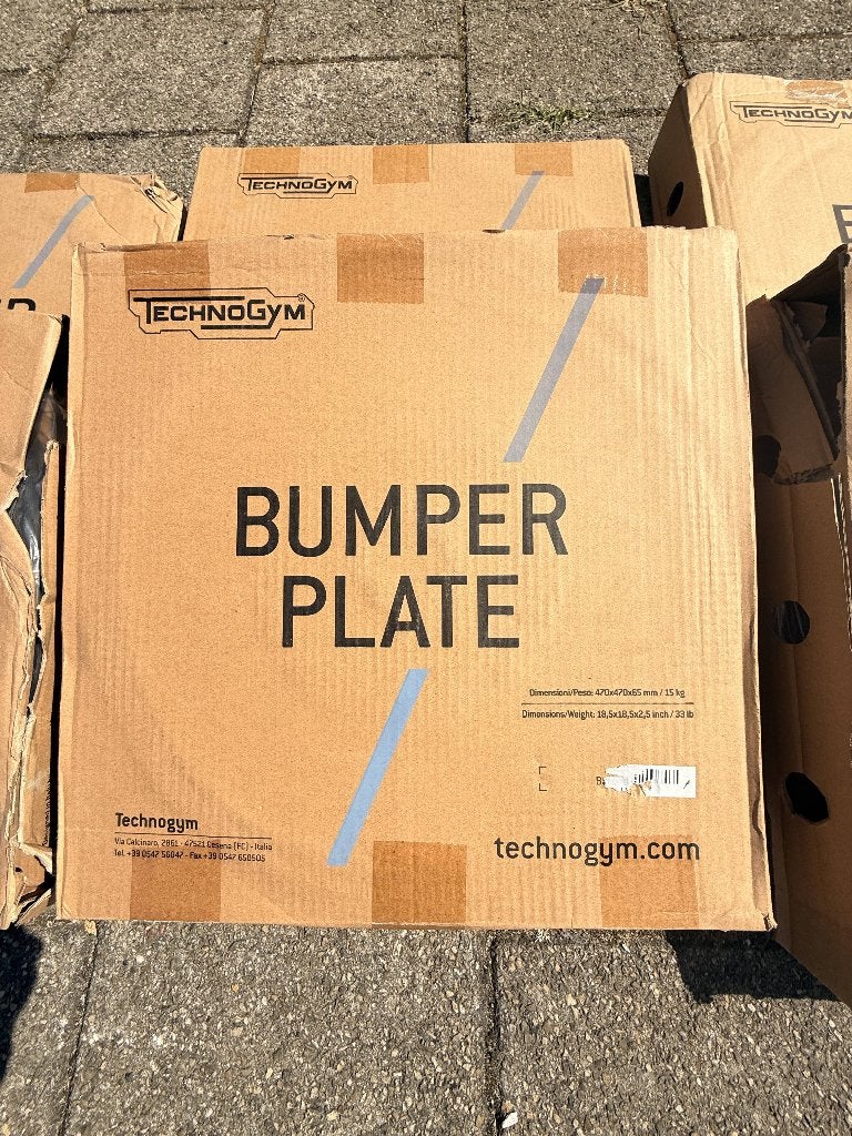 Nieuw in doos 150 kg: Technogym BumperPlate Sets, Ophalen, Nieuw, Benen, Halterschijven