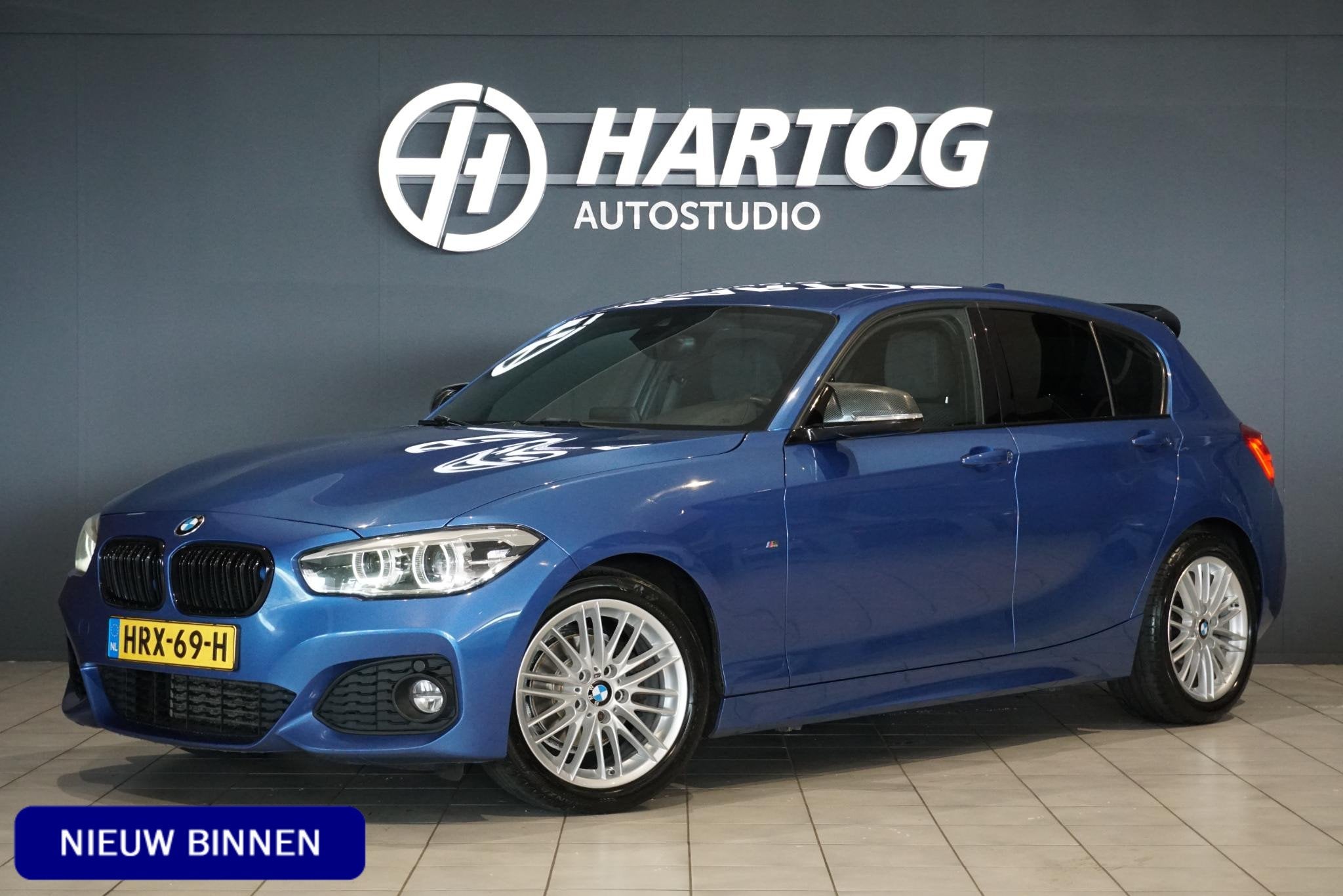 BMW 1-serie 118i High Executive M Sport + CAMERA | HARMAN/KA, Gebruikt, Blauw, Alcantara, Bedrijf