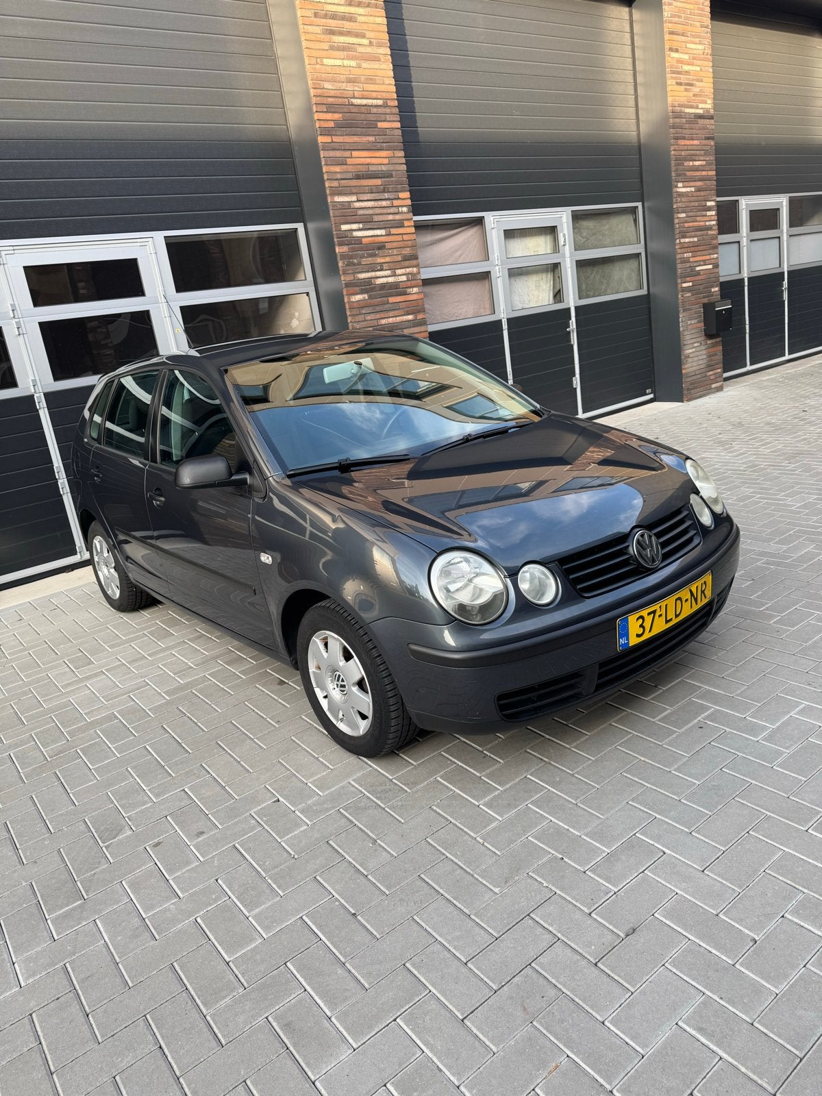 Volkswagen Polo 1.4 55KW 2002 Blauw, Auto's, Voorwielaandrijving, 4 cilinders, Blauw, Origineel Nederlands