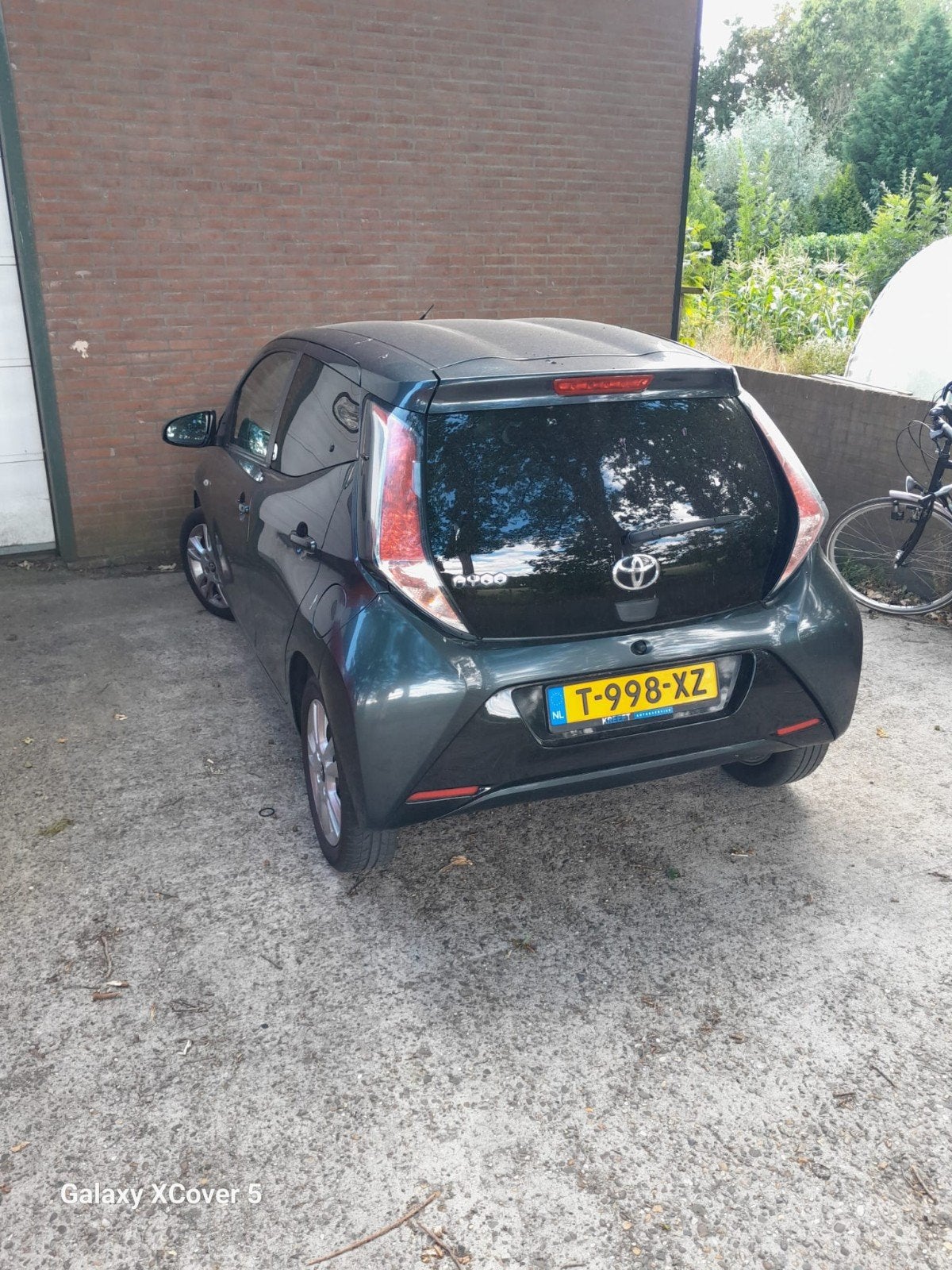 Toyota Aygo 1.0 Vvt-i 69pk 5D 2018 Grijs, Auto's, Voorwielaandrijving, 4 stoelen, Handgeschakeld, 26 km/l