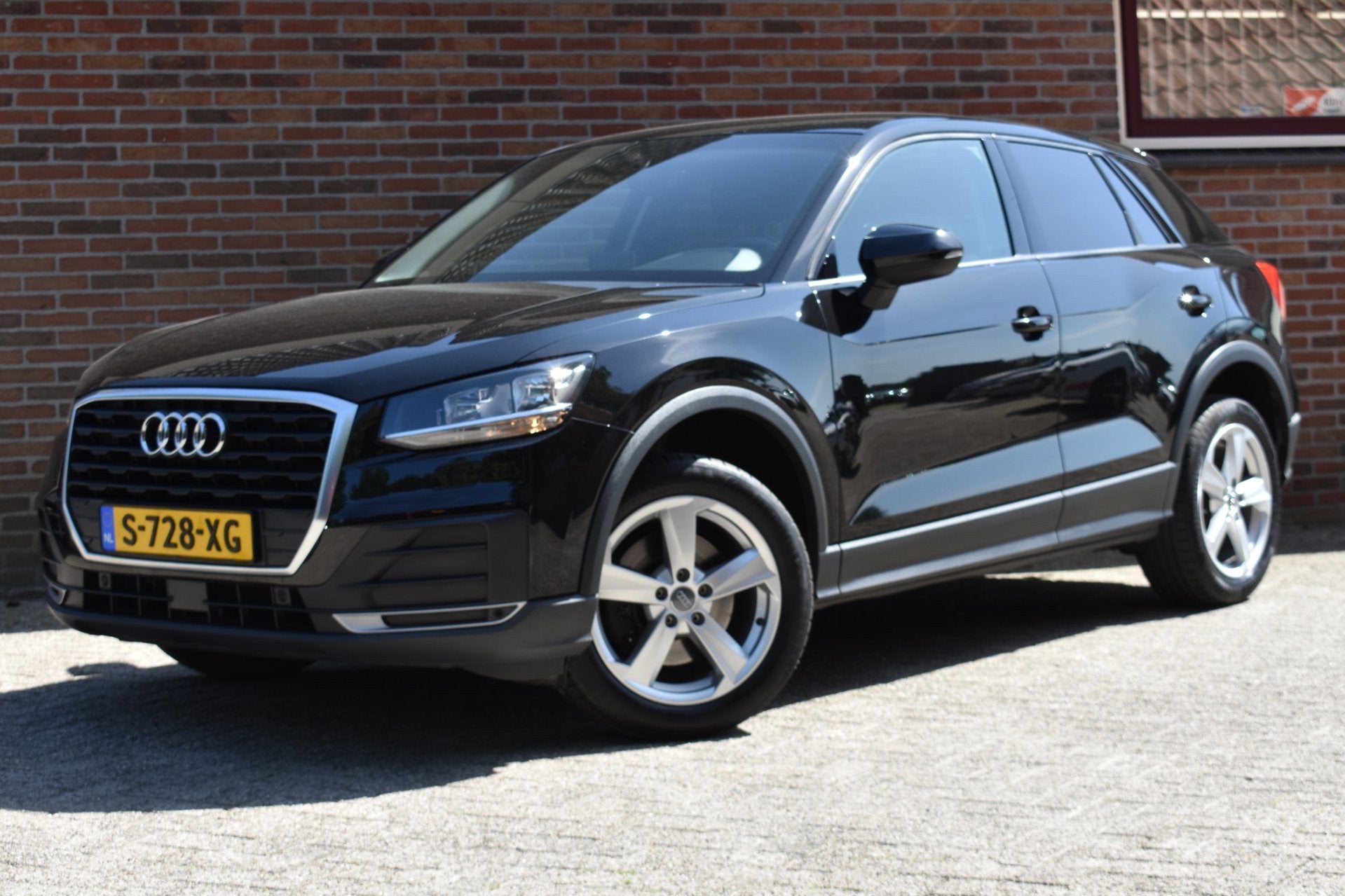 Audi Q2 1.0 TFSI Sport '17 Airco Cruise Navi Inruil mogelijk, Auto's, Voorwielaandrijving, Gebruikt, 116 pk, Zwart